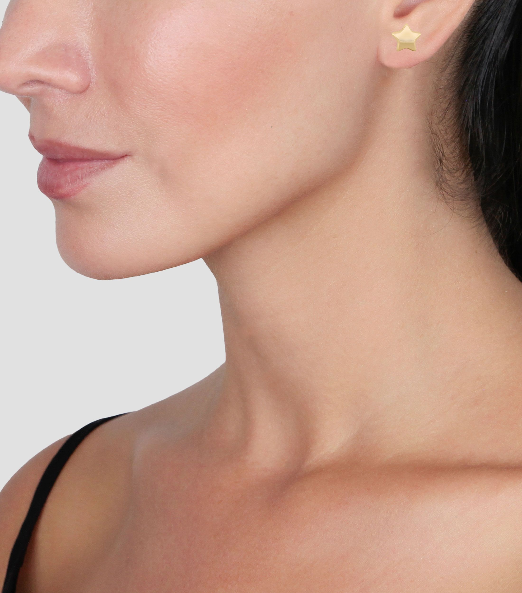 Aretes en oro de 14 kilates Estrellas Mujer