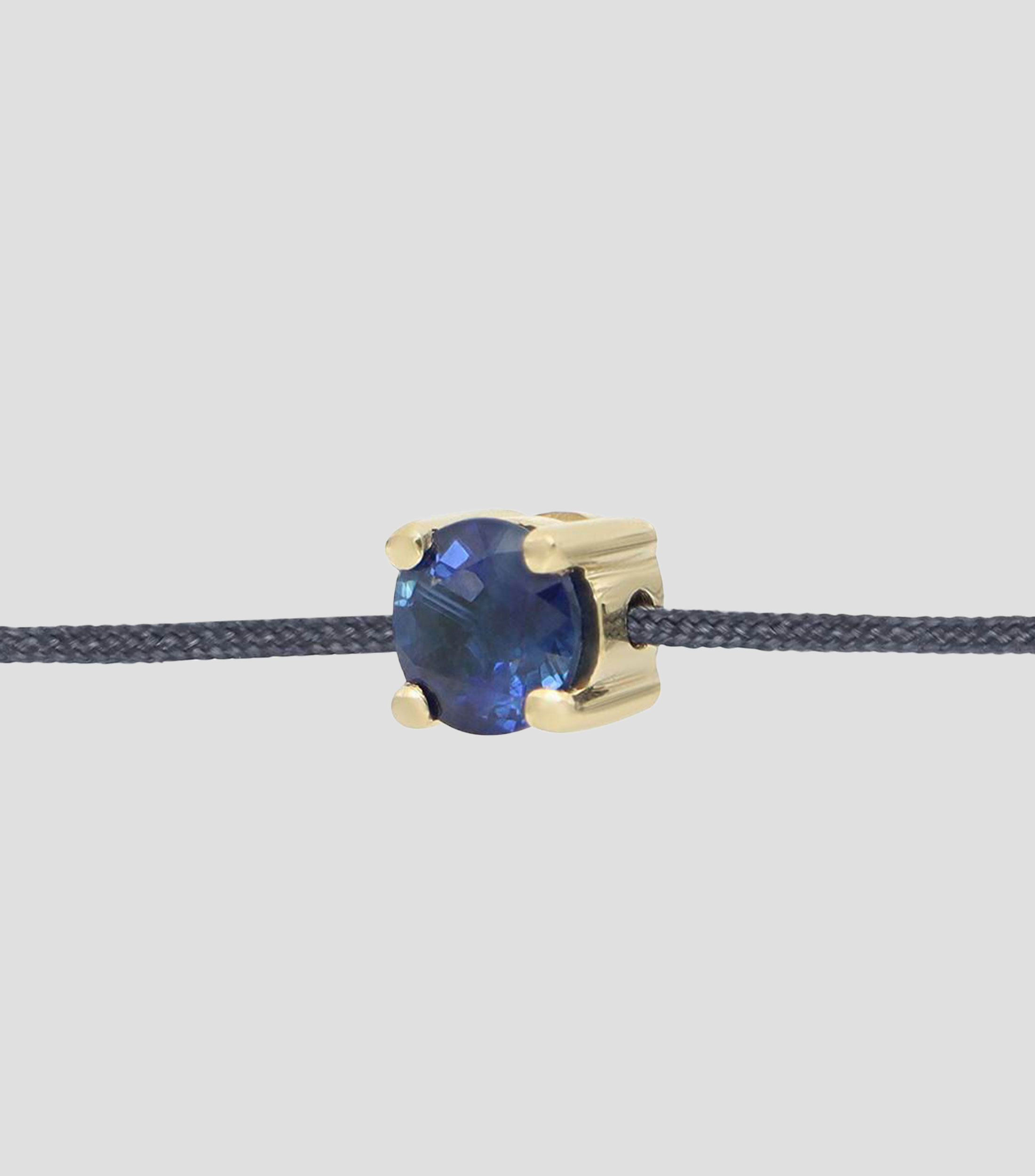 Pulsera con Dije en Oro Amarillo de 18 Kilates con Zafiro Mujer