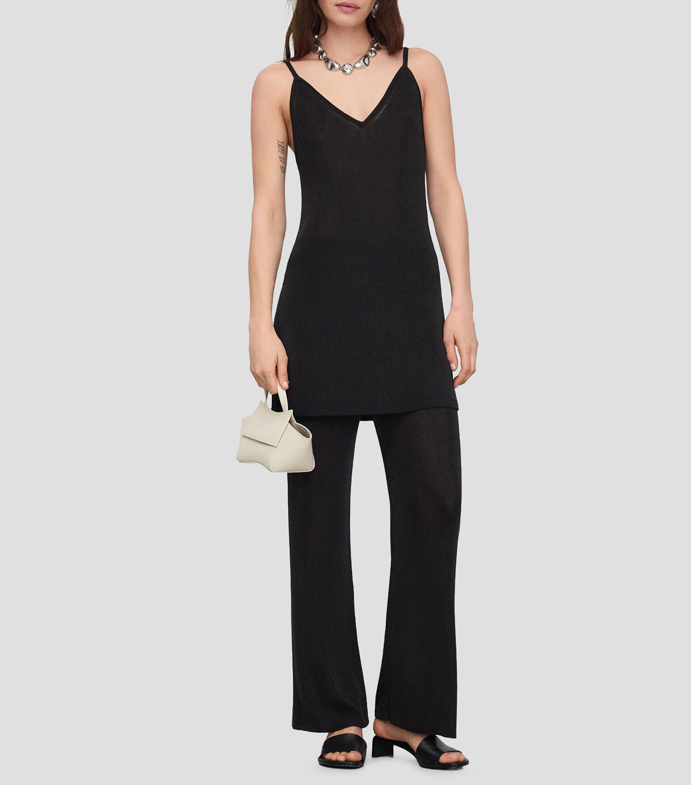 Top cuello V sin mangas liso Mujer