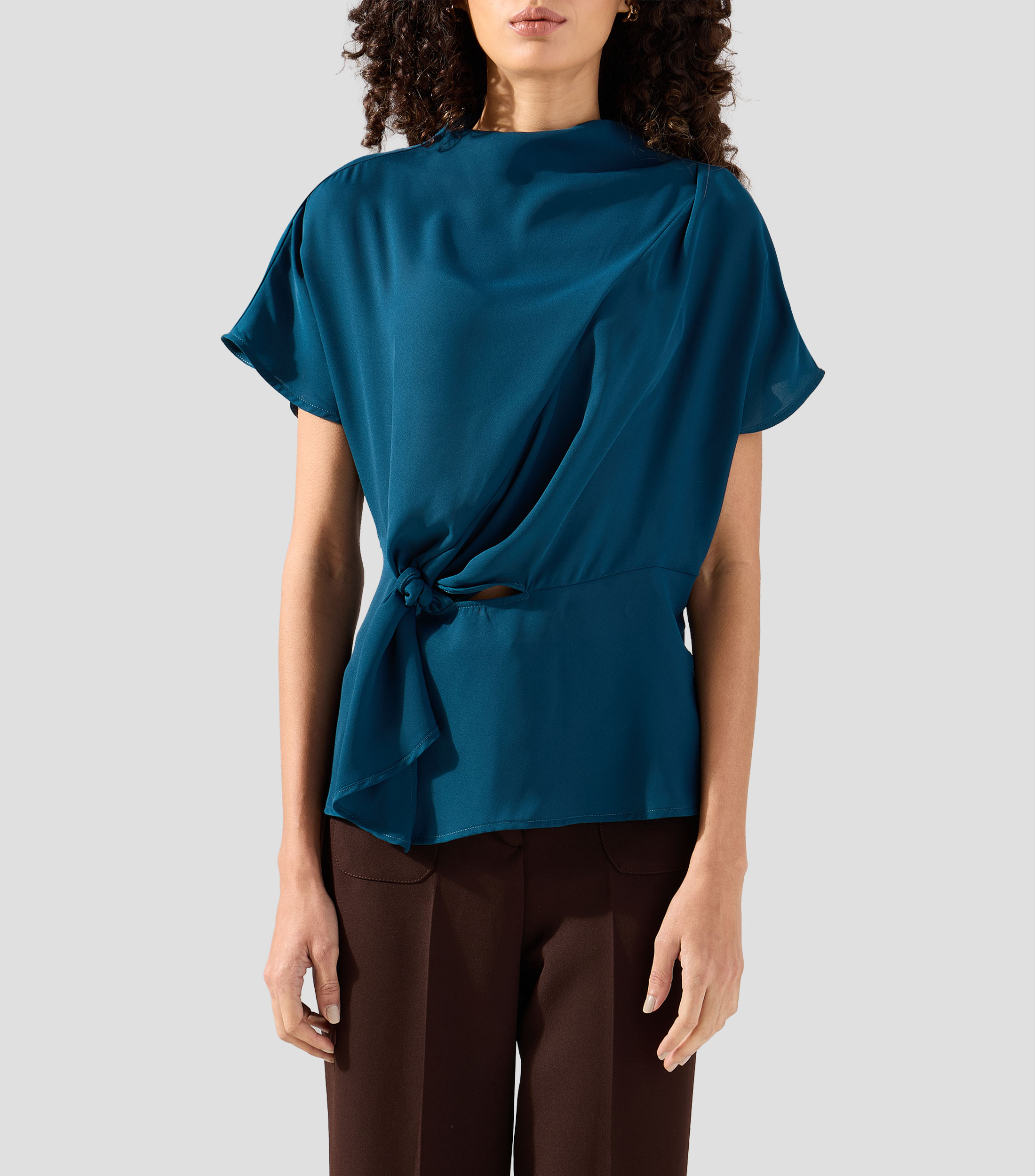 Blusa lisa sin mangas Mujer