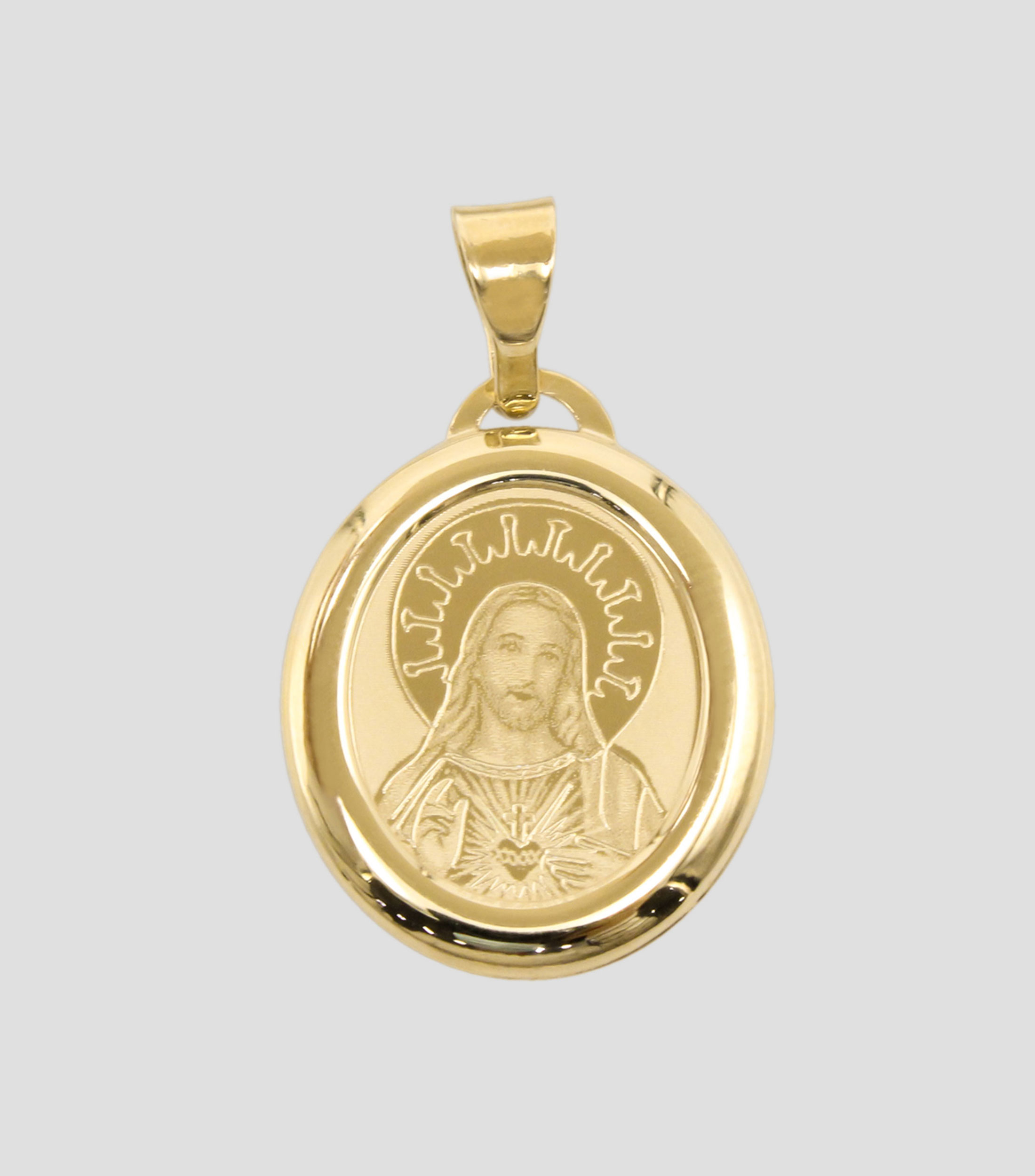 Medalla en oro amarillo 14 Kilates Sagrado Corazón Unisex