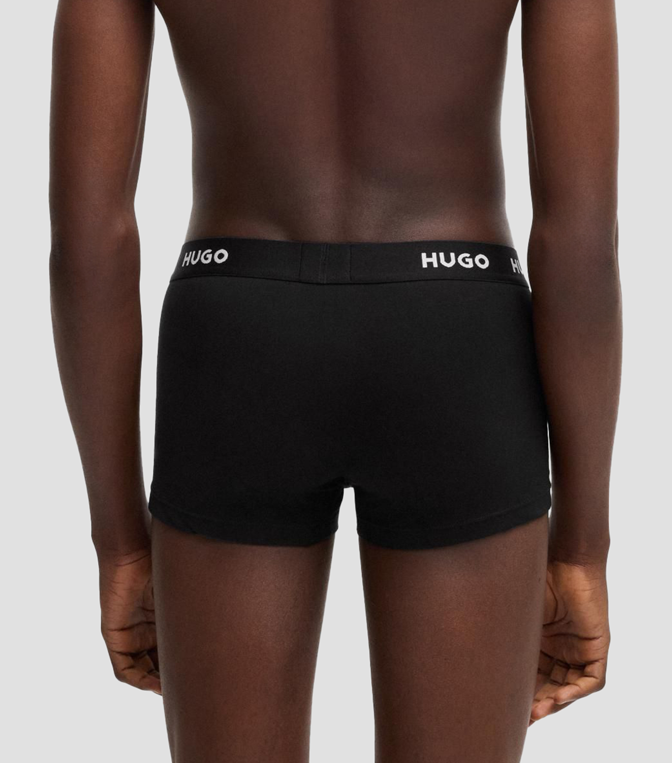 Paquete de tres boxers de algodón elástico con logos en la cintura Hombre