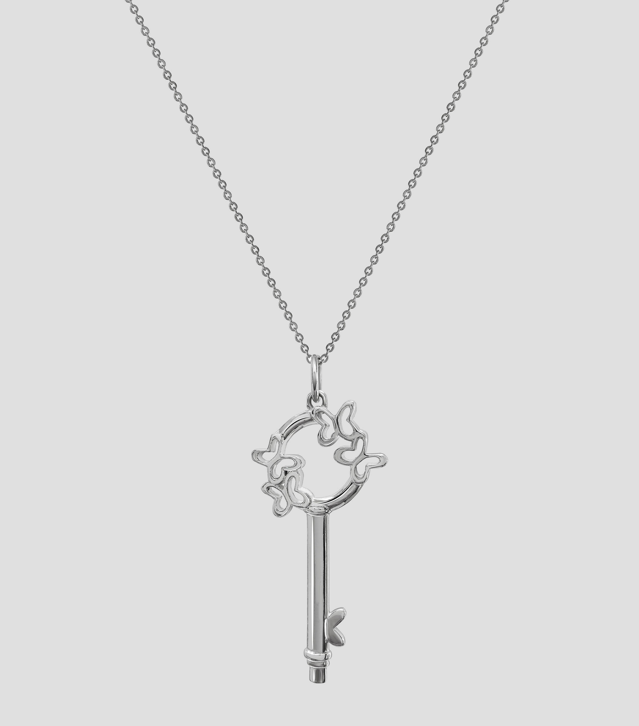 Dije Llave Libertad en plata .925 Mujer