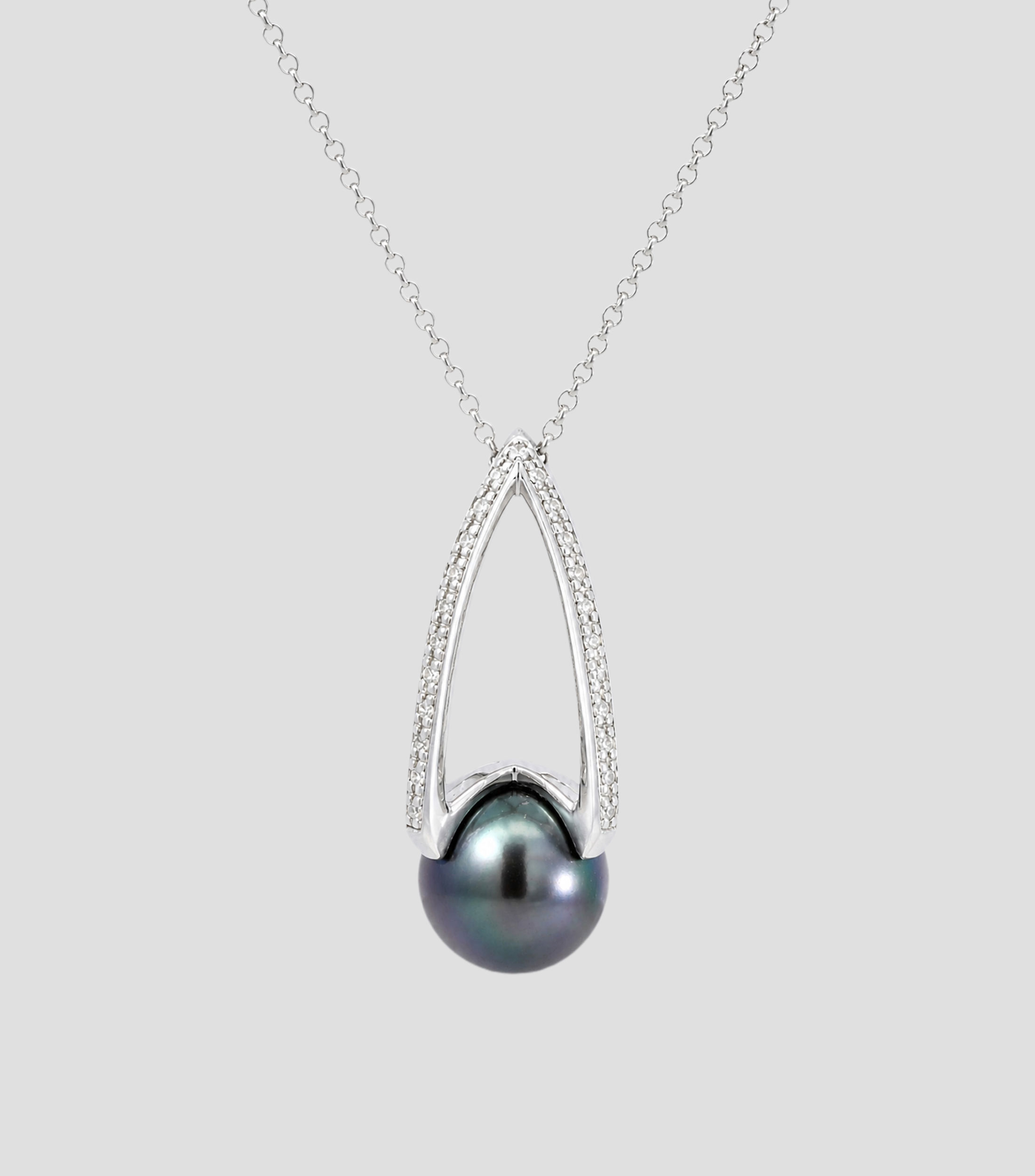 Dije en Oro de 14 Kilates con diamantes y perla Mujer