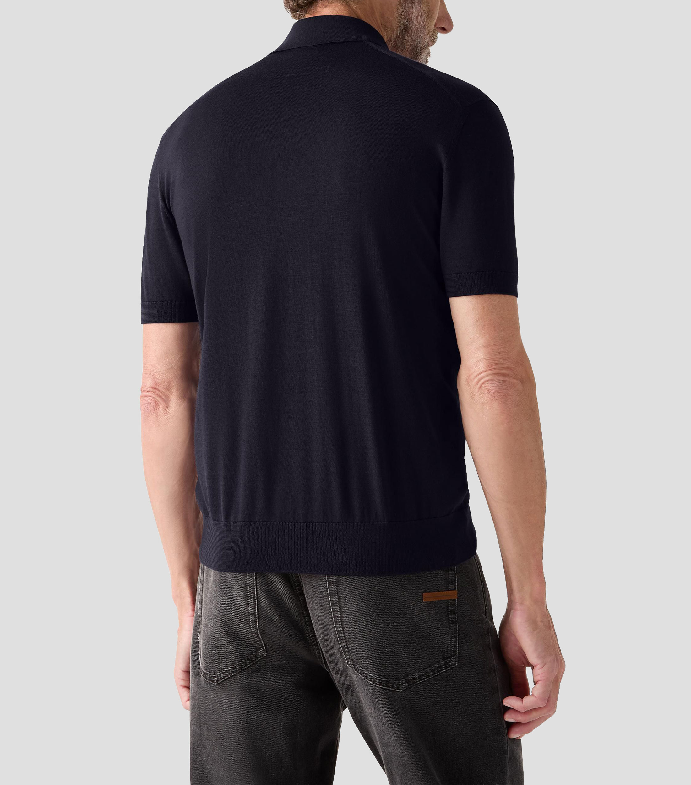 Playera tipo polo con manga corta lisa Hombre