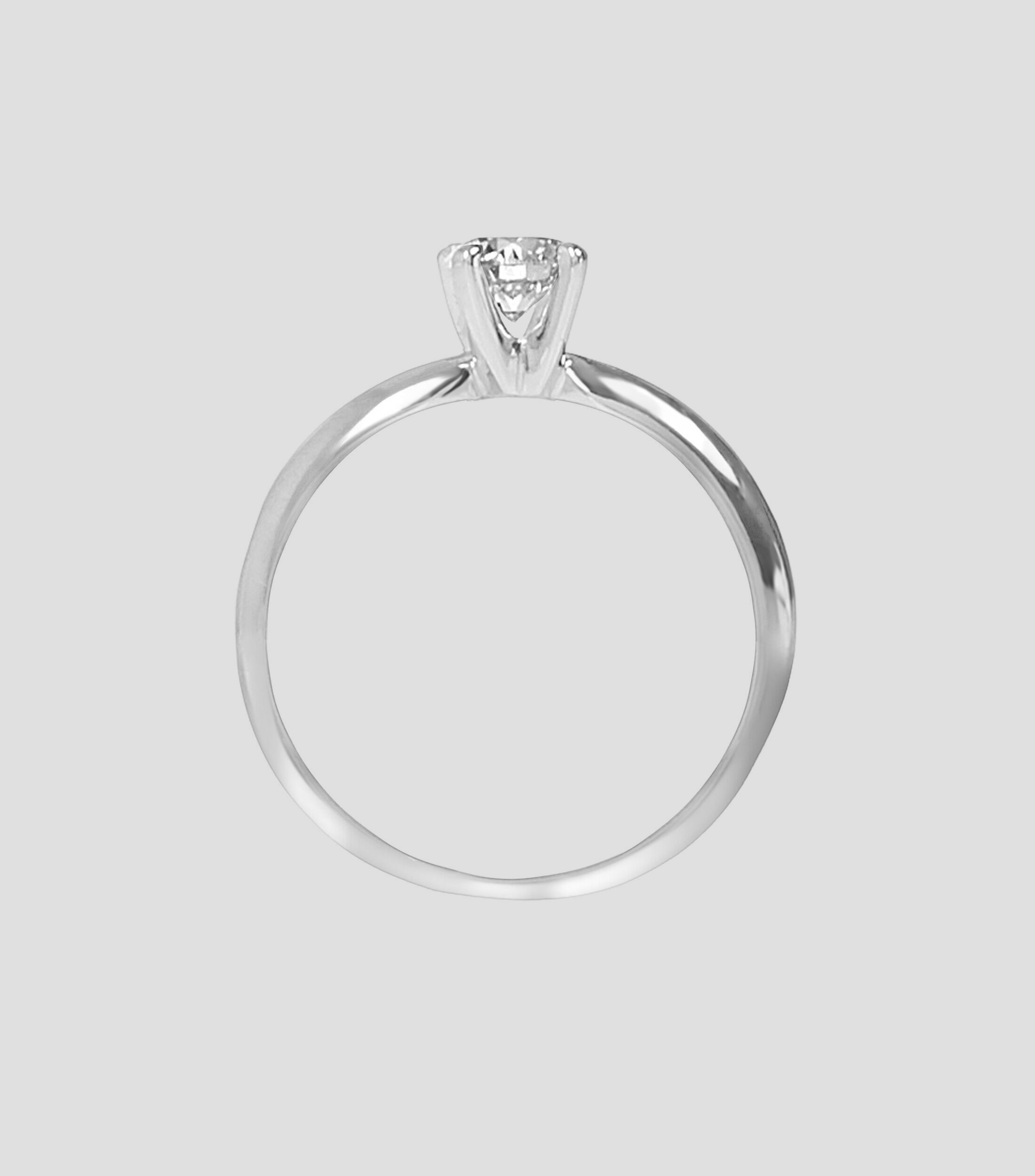 Anillo solitario en oro blanco 14 Kts con brillante Mujer