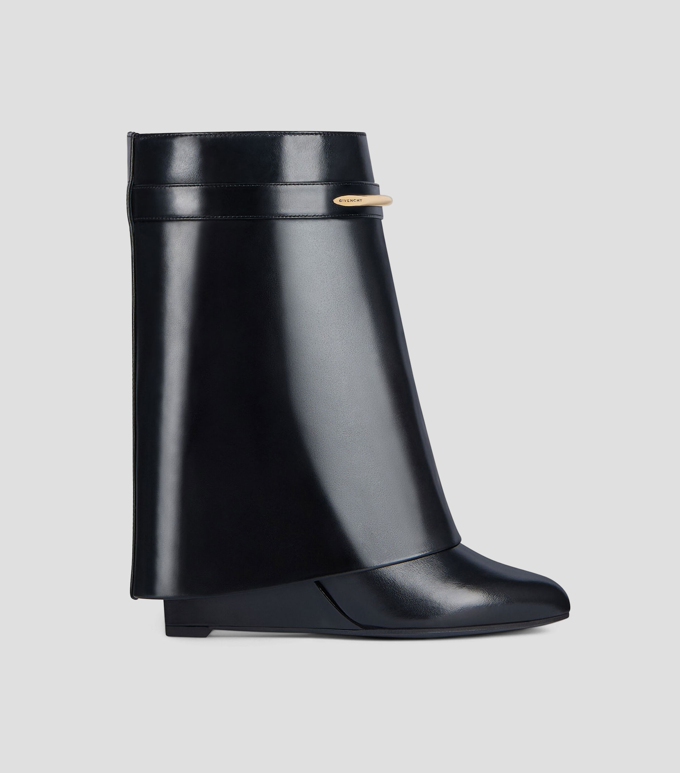Botas cortas en piel con tacón medio de cuña Mujer