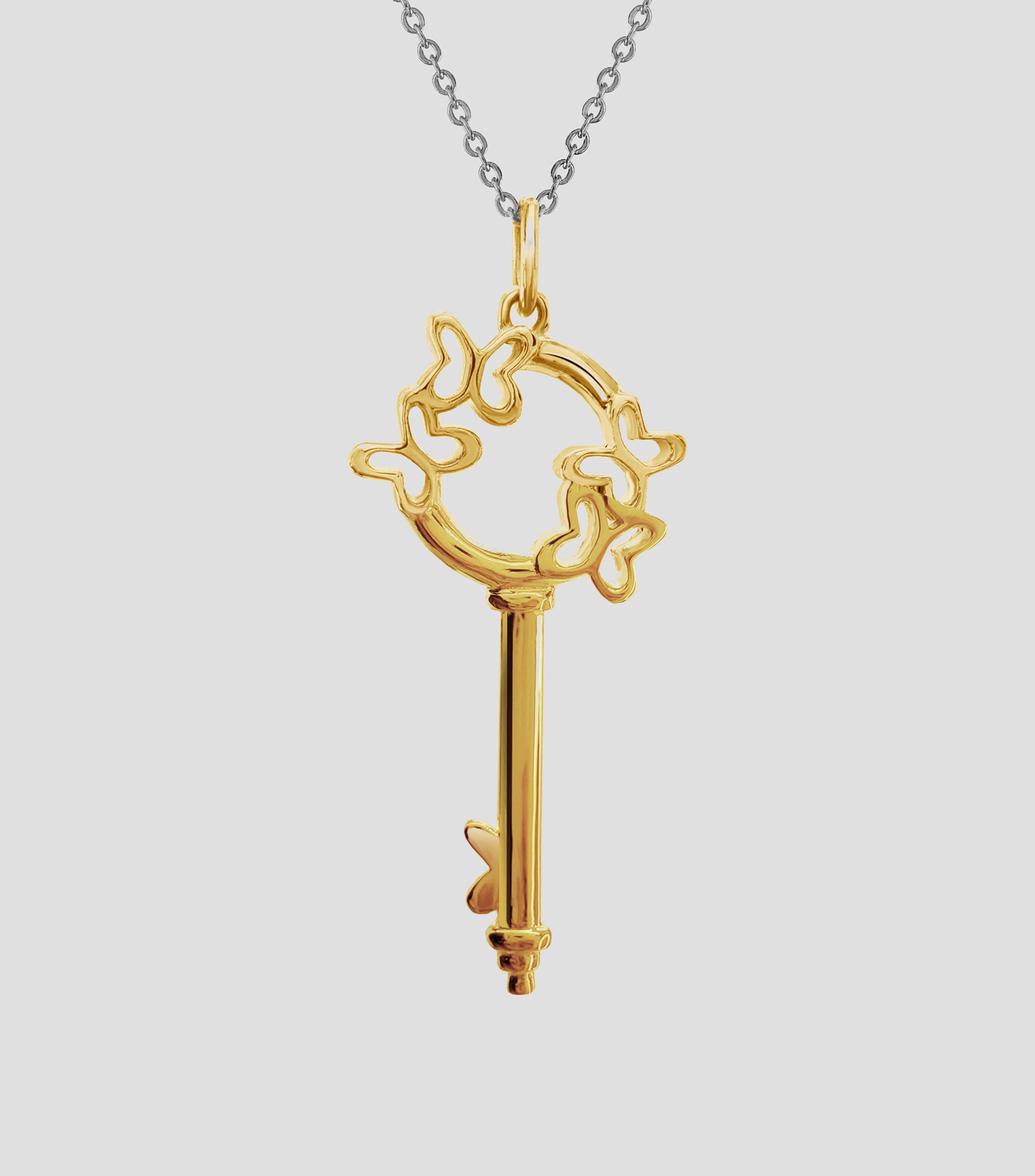 Dije en Plata .925 Llave con Mariposas Mujer
