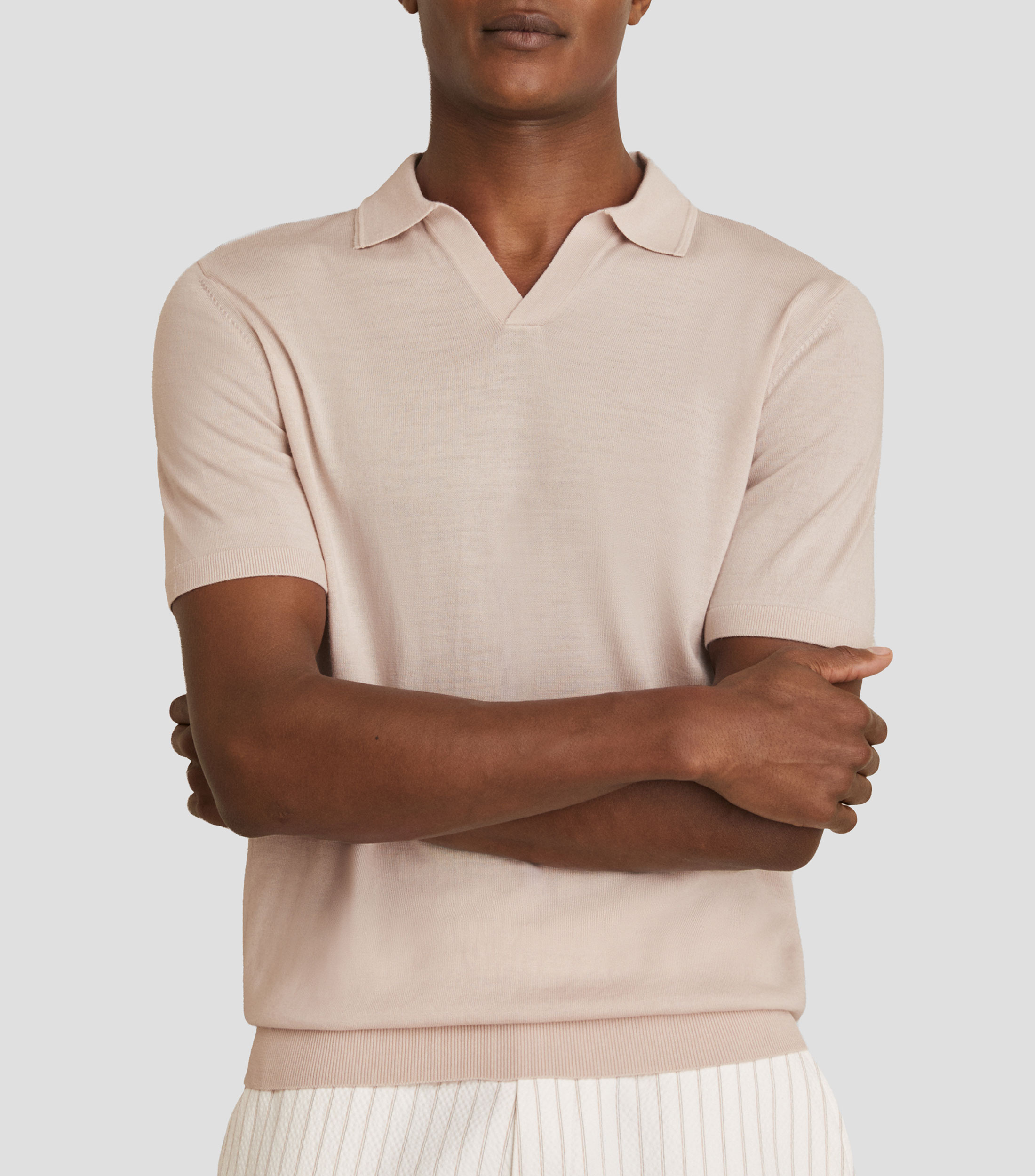 Playera tipo polo con manga corta lisa Hombre