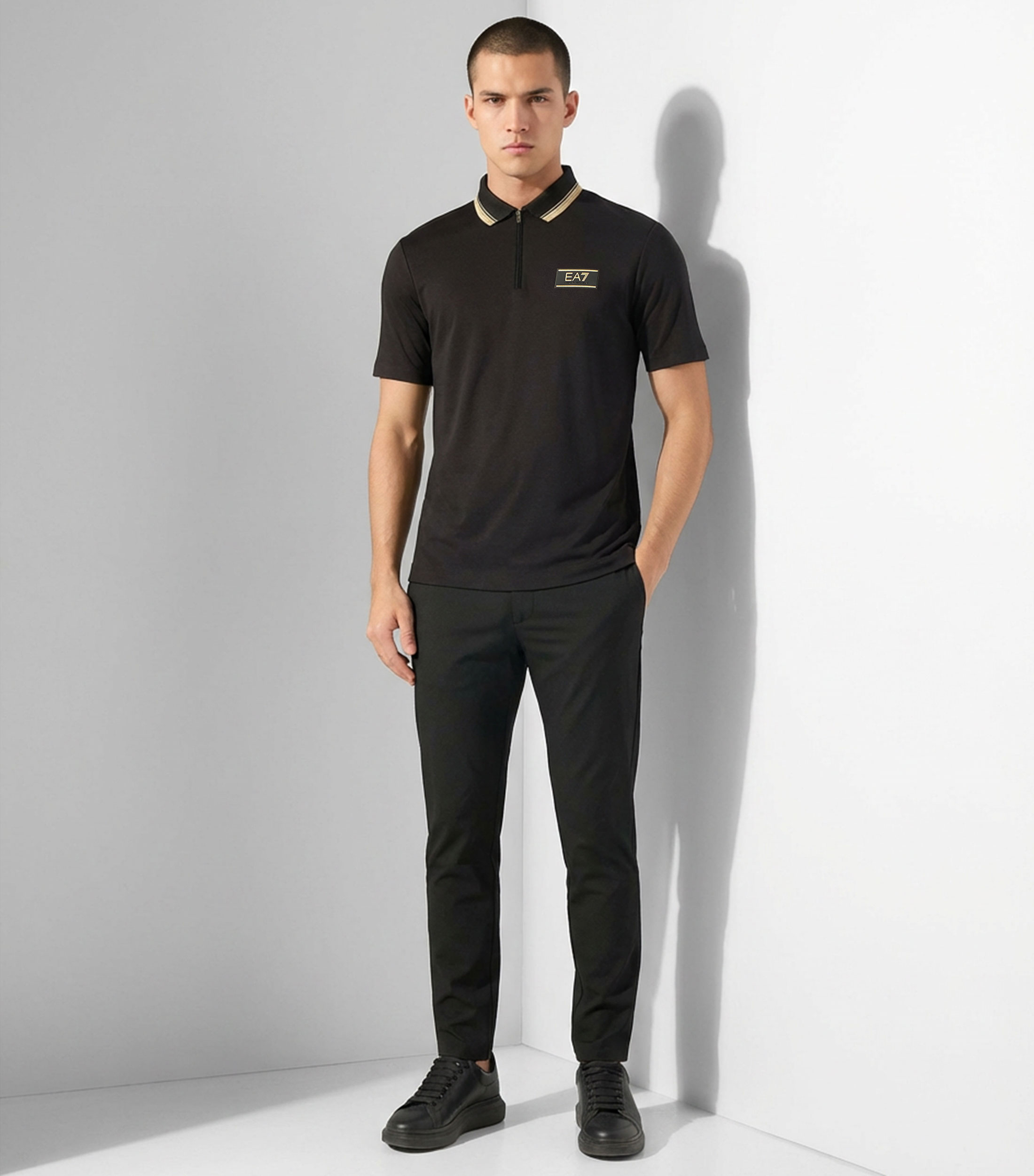 Playera tipo polo con manga corta lisa Hombre