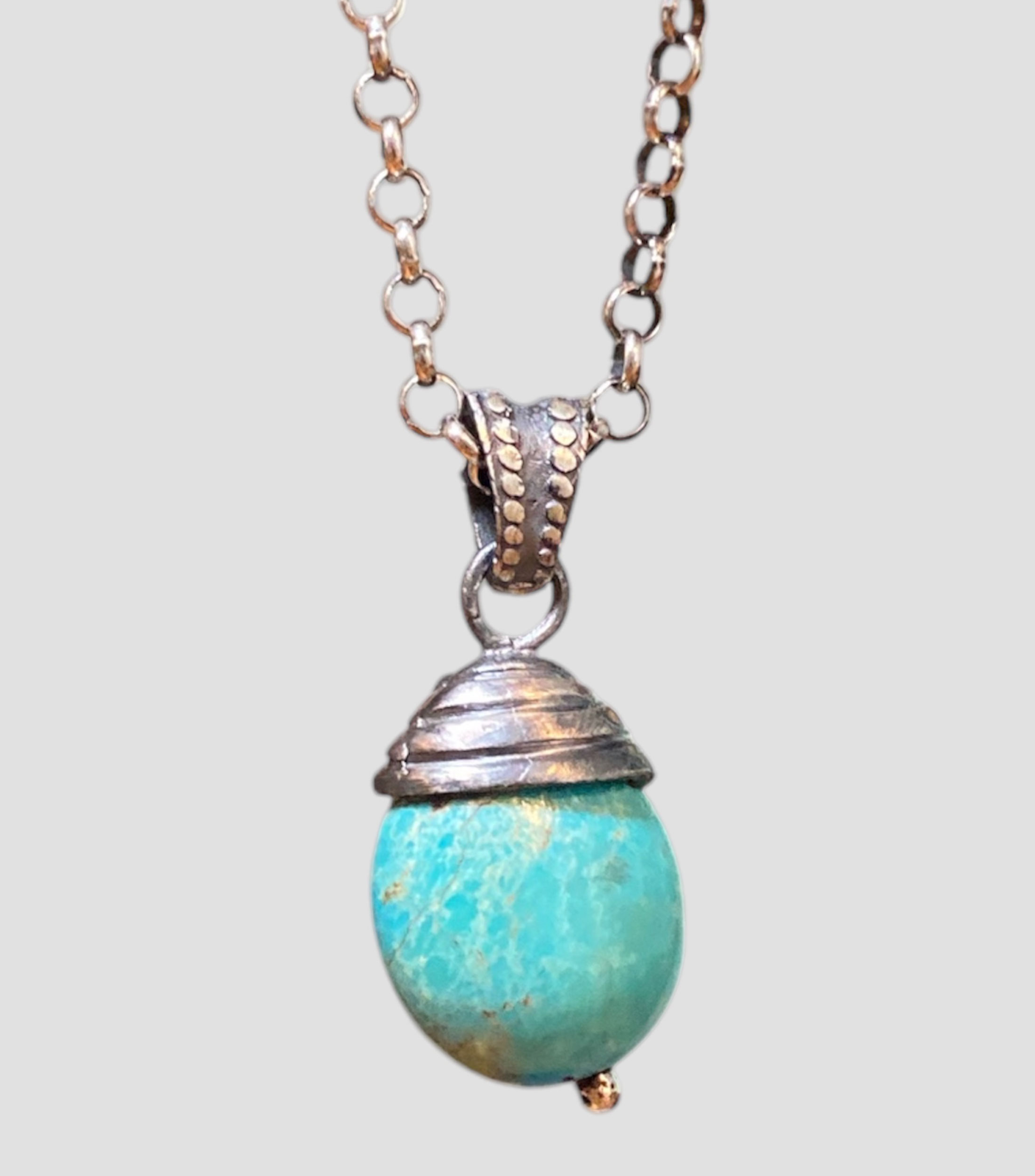 Dije en plata turquesa Hombre