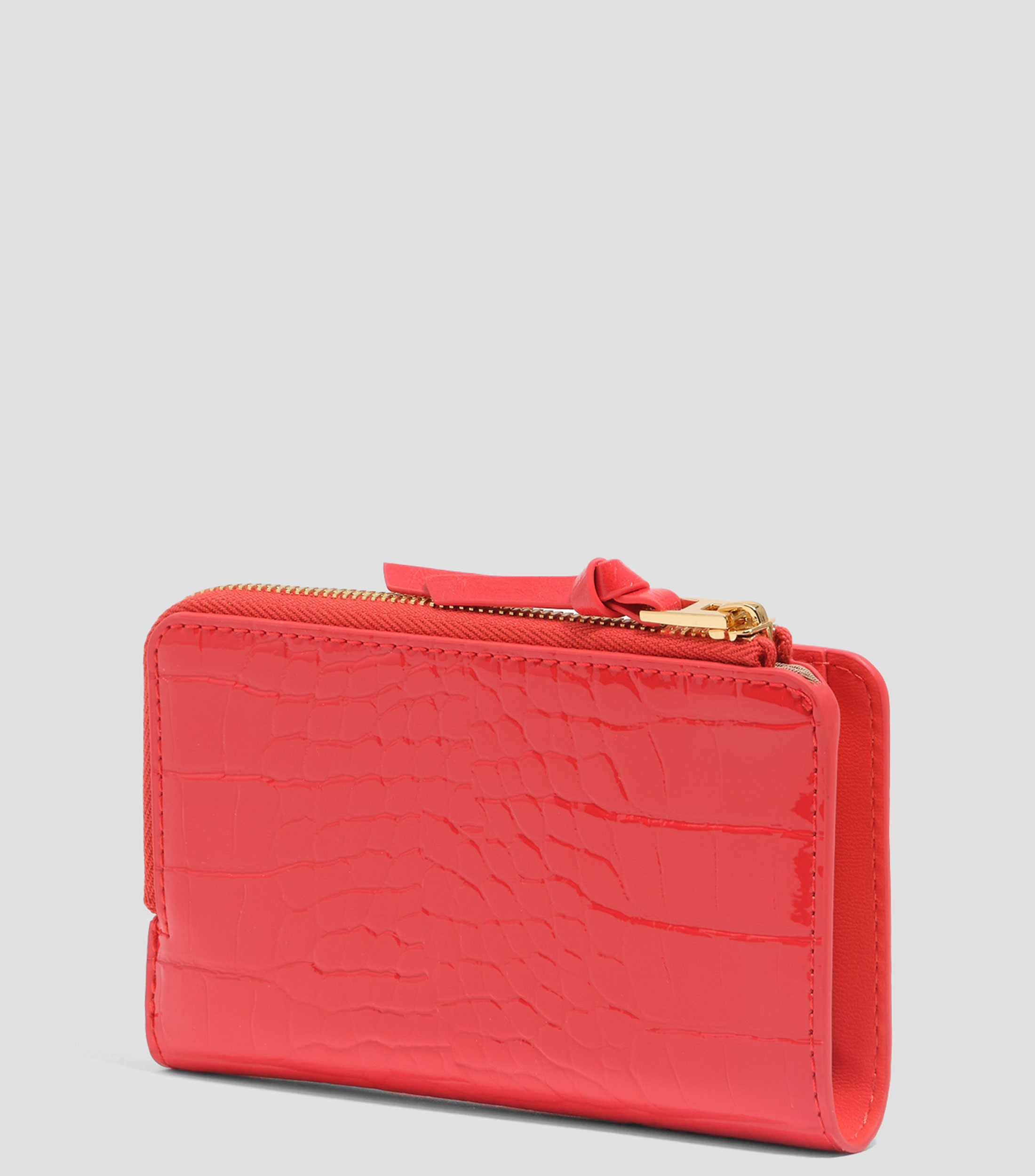 Cartera con textura y brillo Mujer