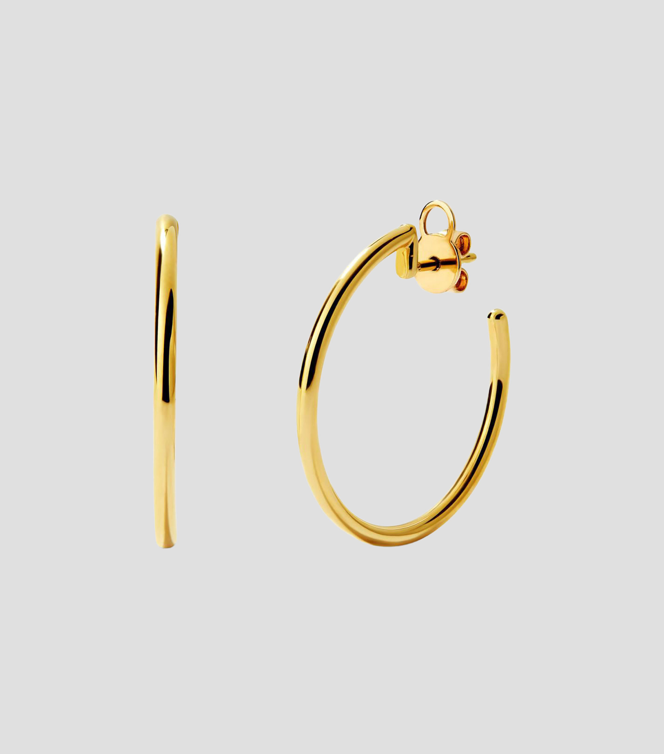 Aretes en Oro amarillo de 18 kilates Mujer