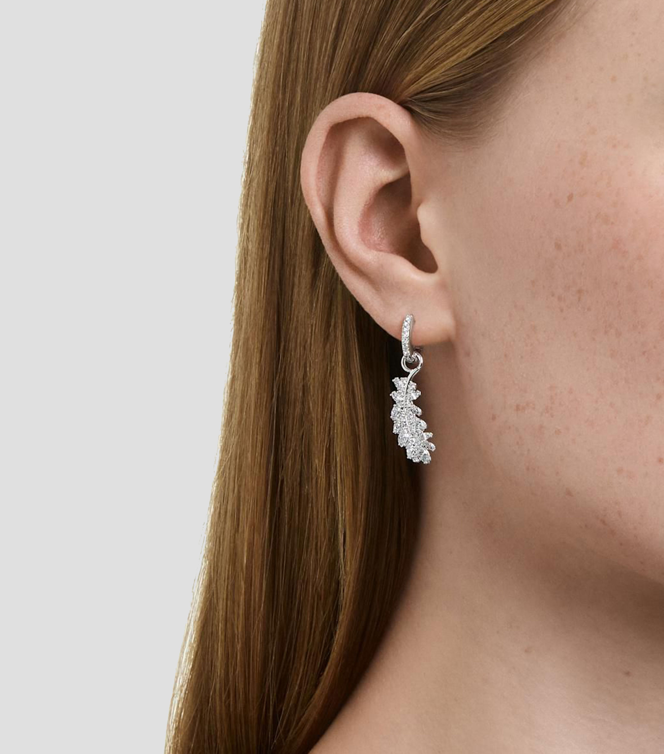 Aretes en rodio en forma de pluma con cristales transparentes Vienna Mujer