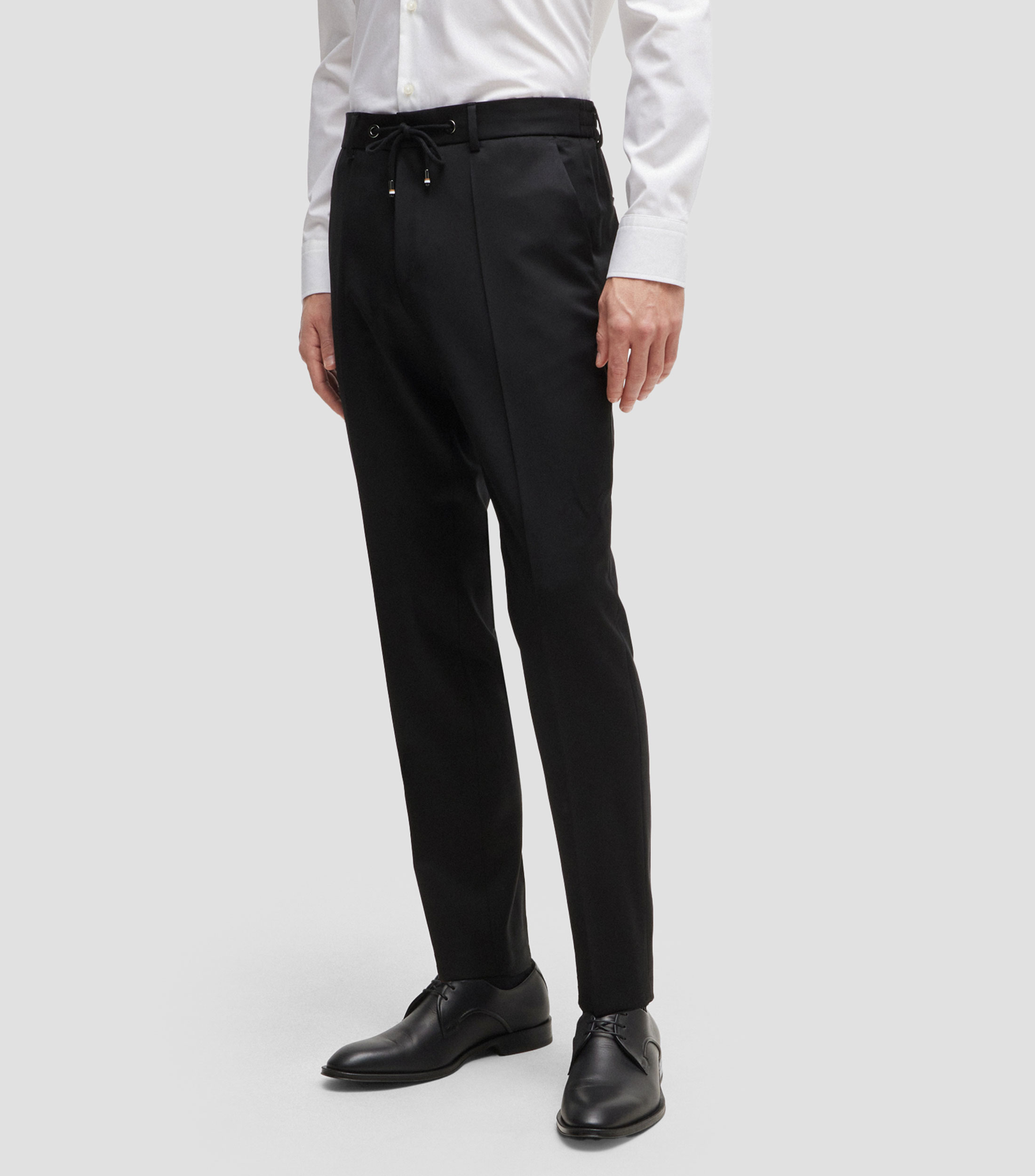 Pantalones slim en sarga de lana virgen Hombre
