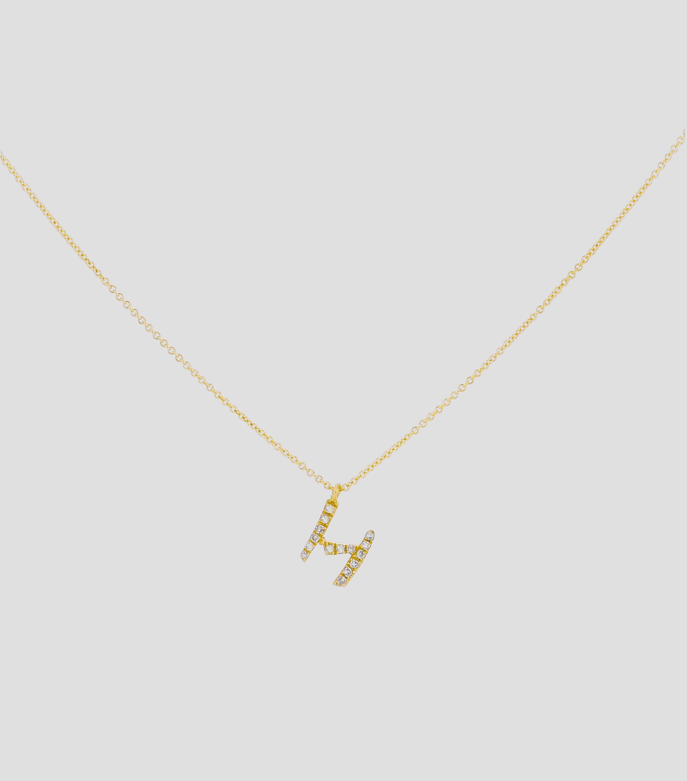 Dije en letra "H" y cadena en Oro amarillo 14 Kts Mujer