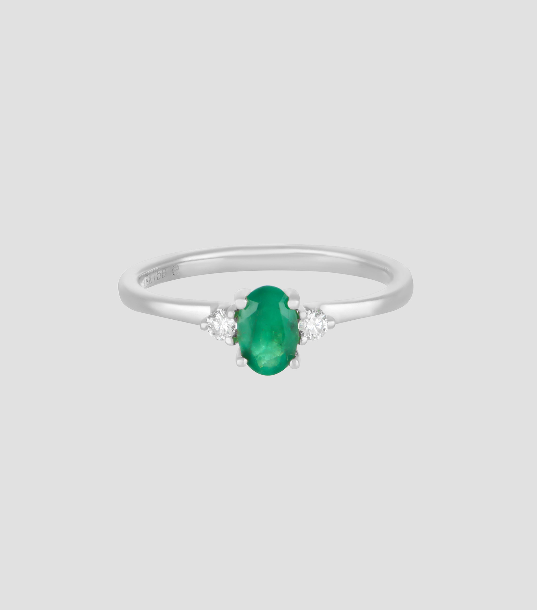 Anillo en oro blanco de 18 Kilates con esmeralda y diamantes Mujer