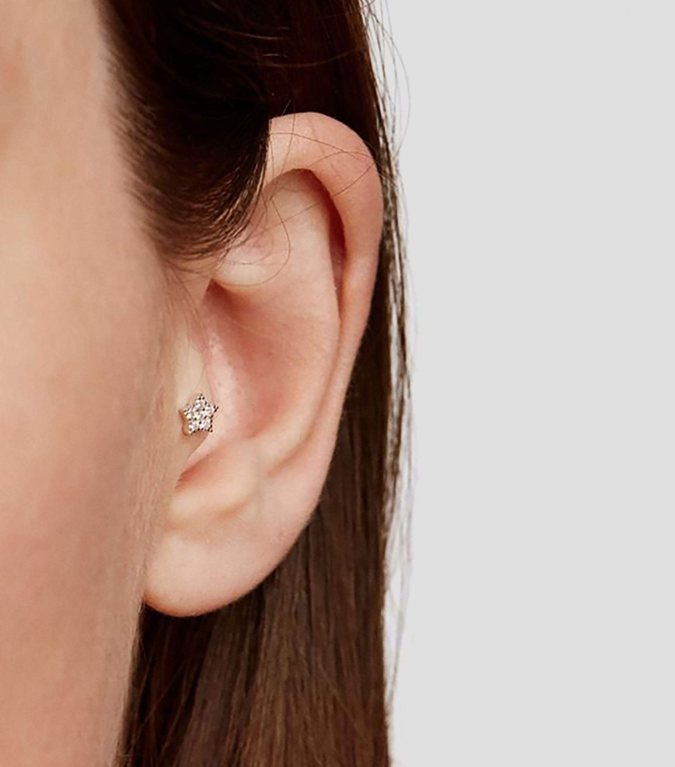 Piercing en oro blanco de 18 kilates con diamante Mujer