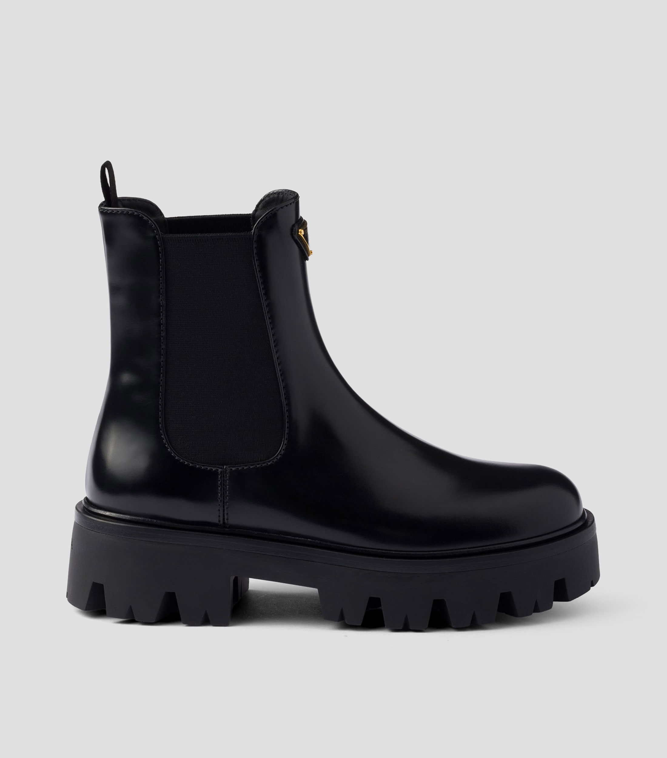 Botines casuales en piel con tacón medio y ancho Mujer