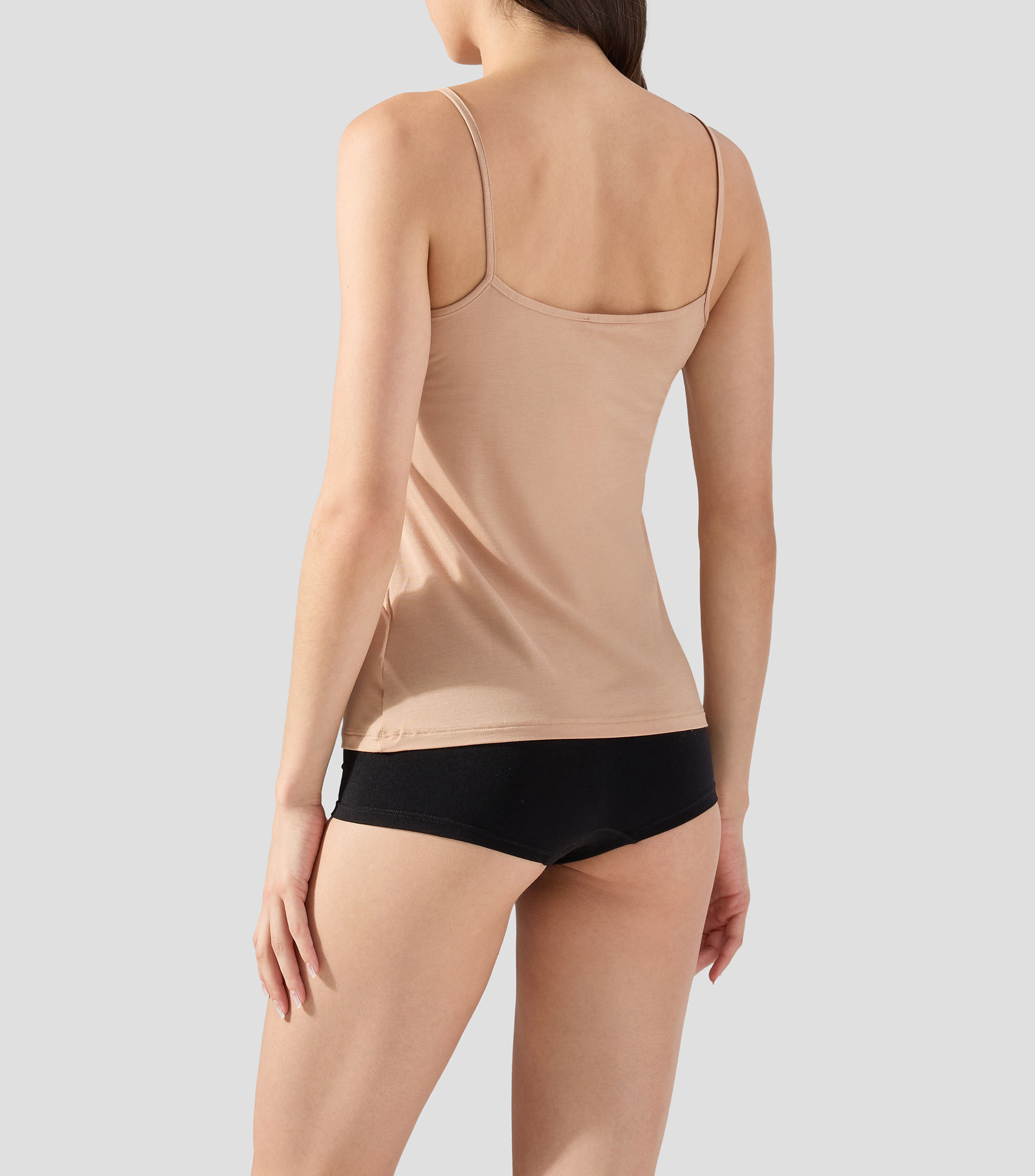 Playera de cuello redondo sin mangas lisa Mujer