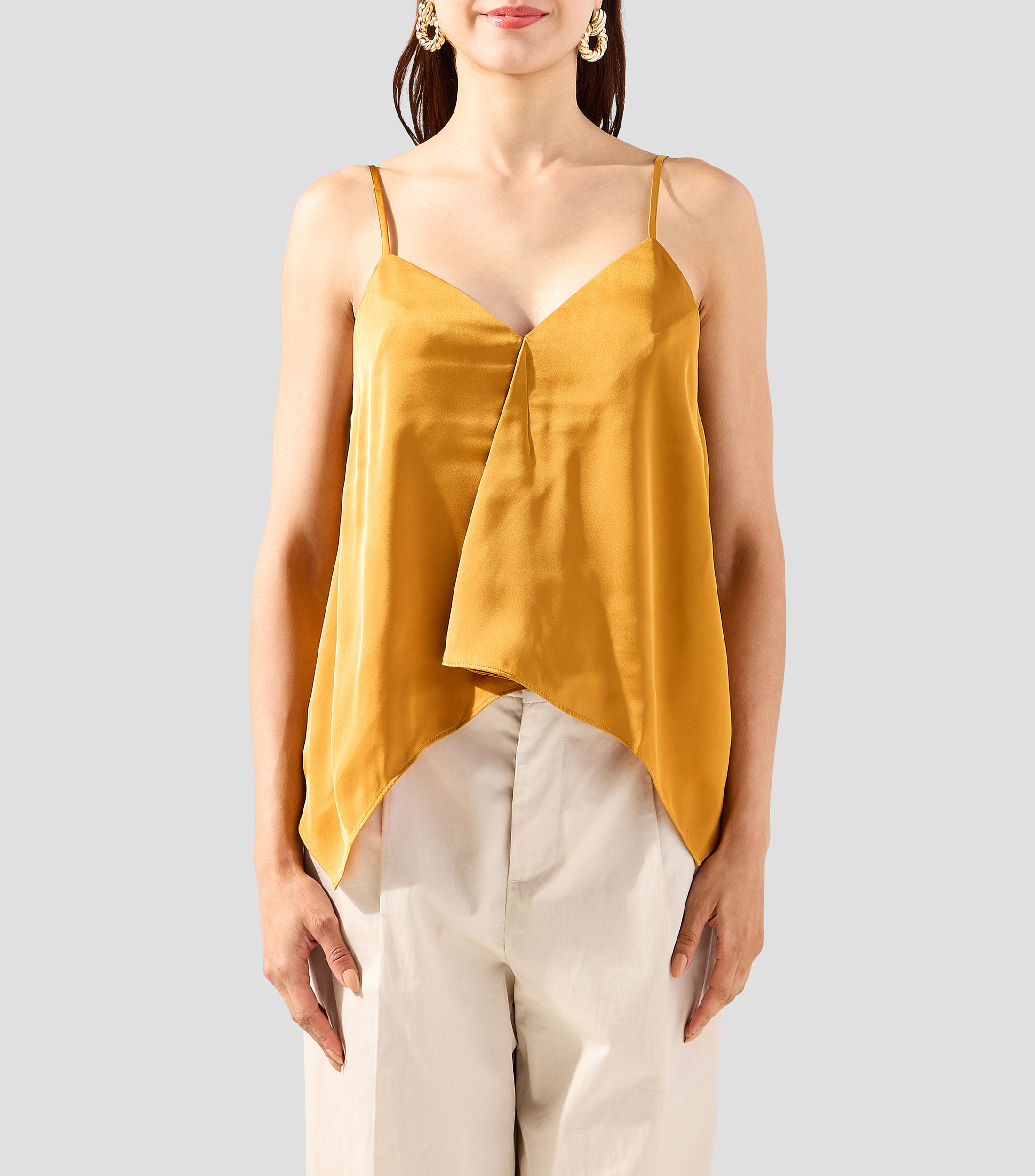 Blusa lisa sin mangas Mujer
