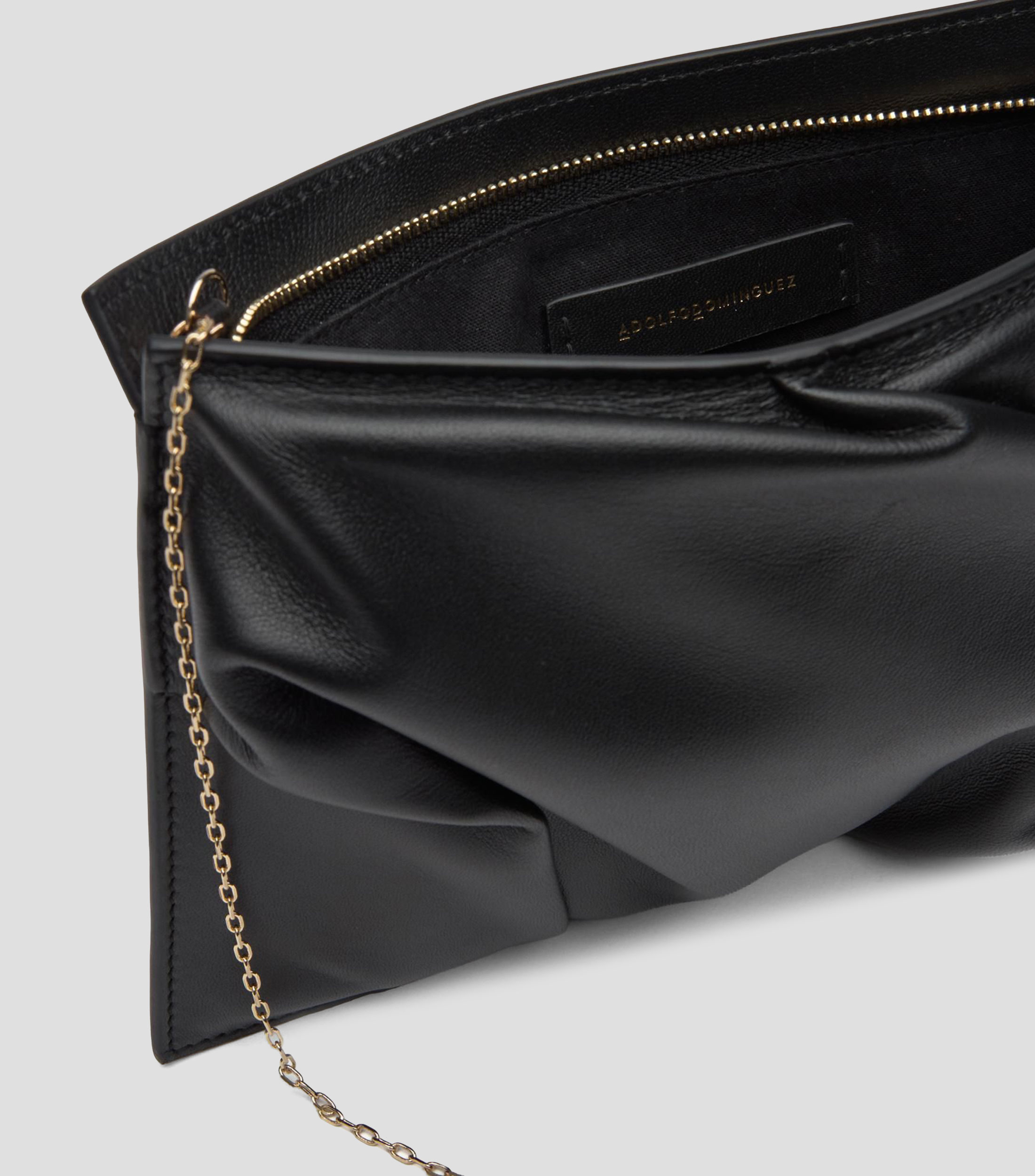 Bolsa Clutch en piel lisa Mujer