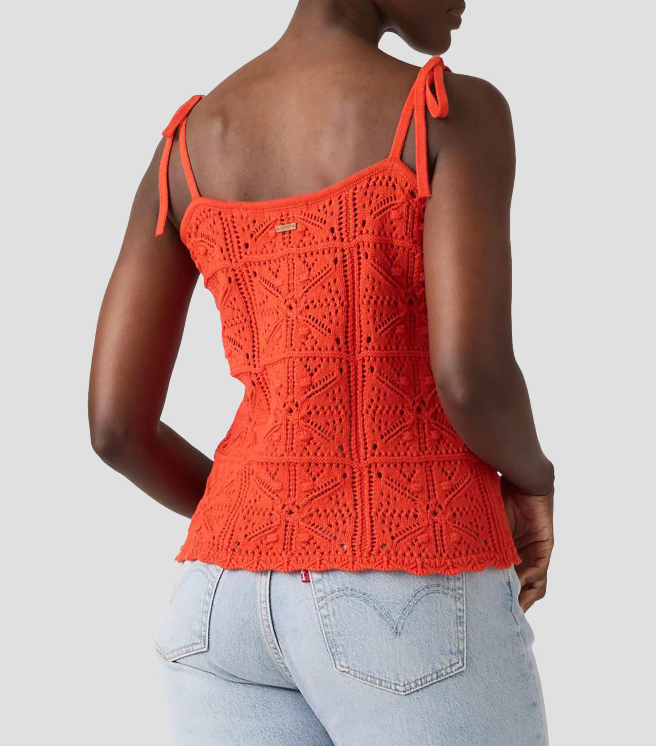 Blusa lisa sin mangas Mujer