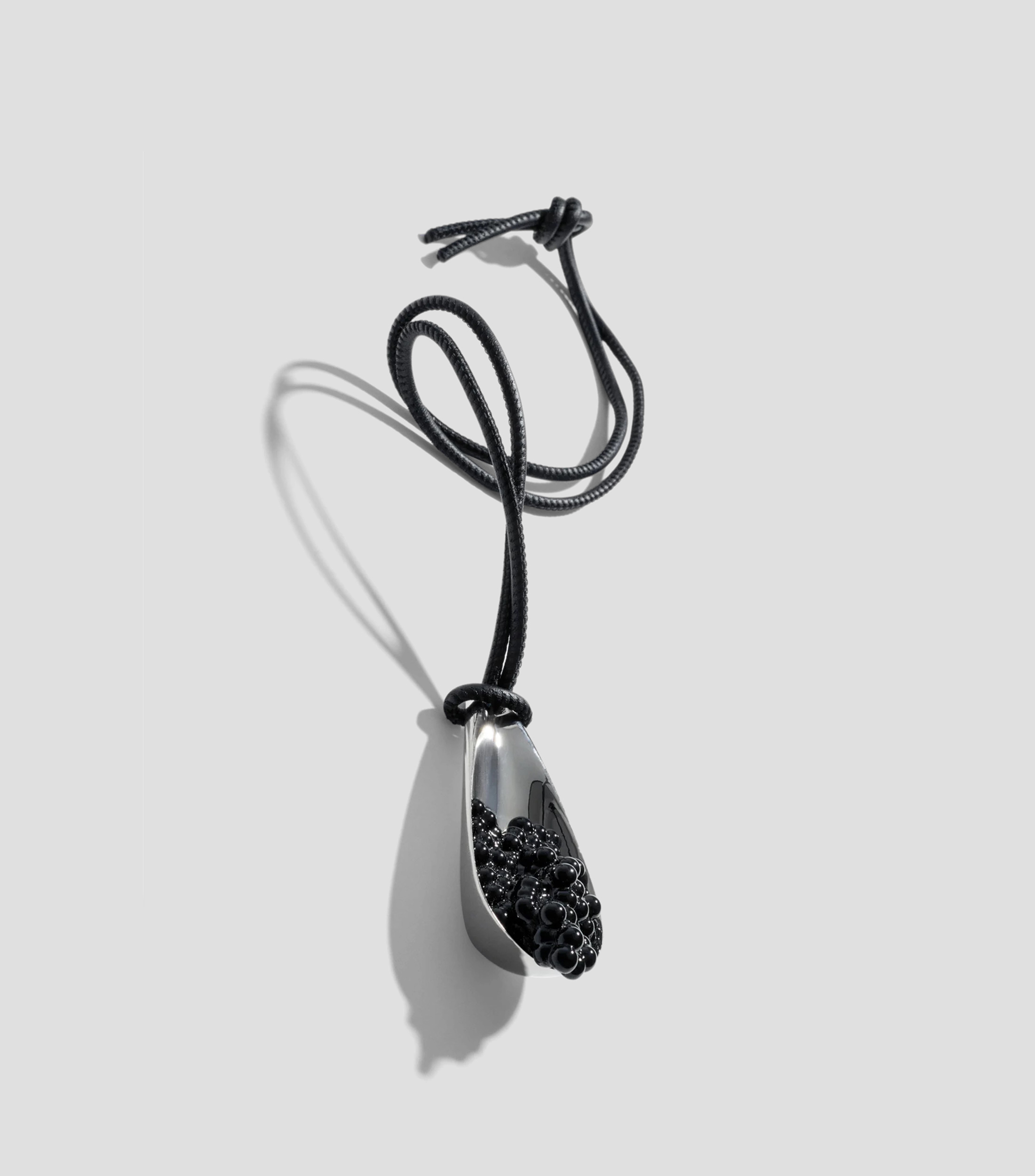 Charm para bolsa de Cuchara con caviar Mujer