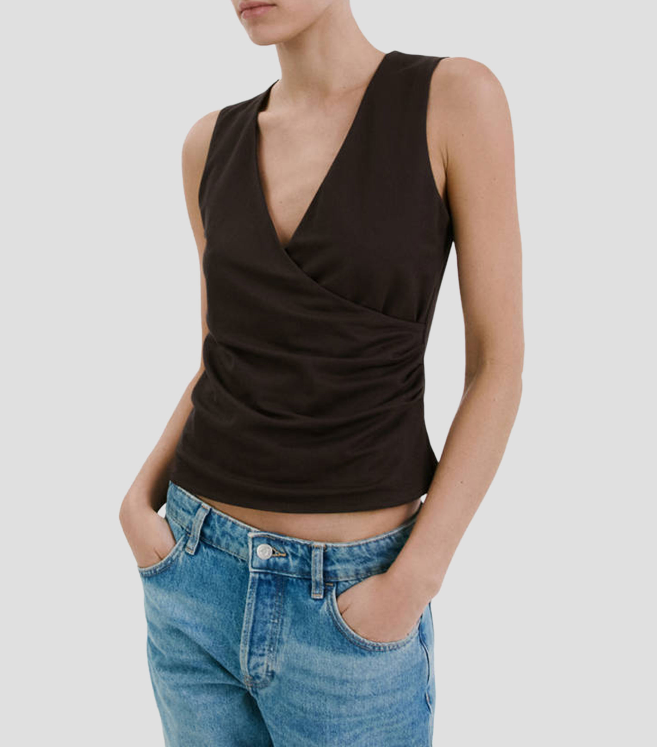 Blusa lisa sin mangas Mujer