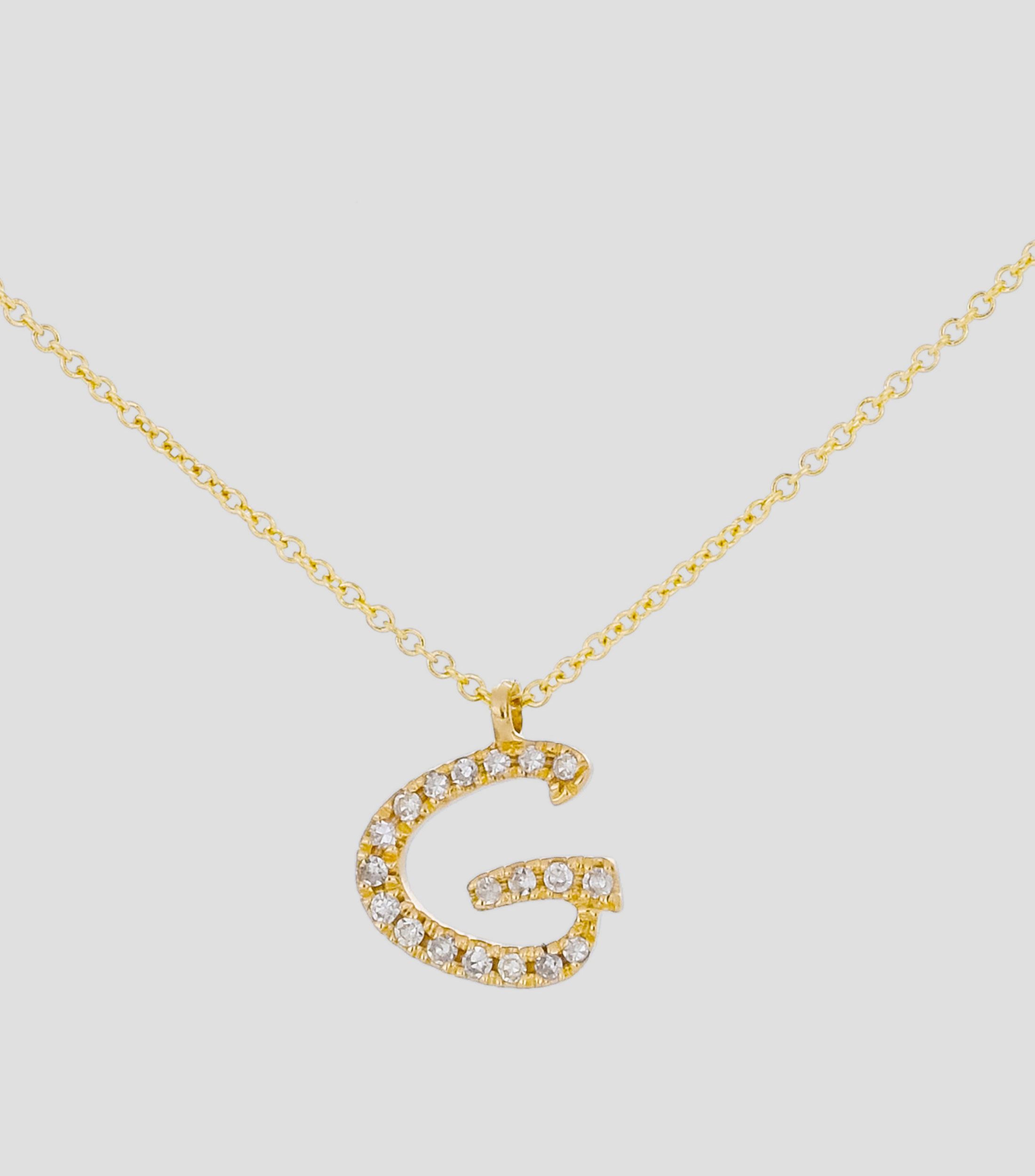 Dije en letra "G" y cadena en Oro amarillo 14 Kts Mujer