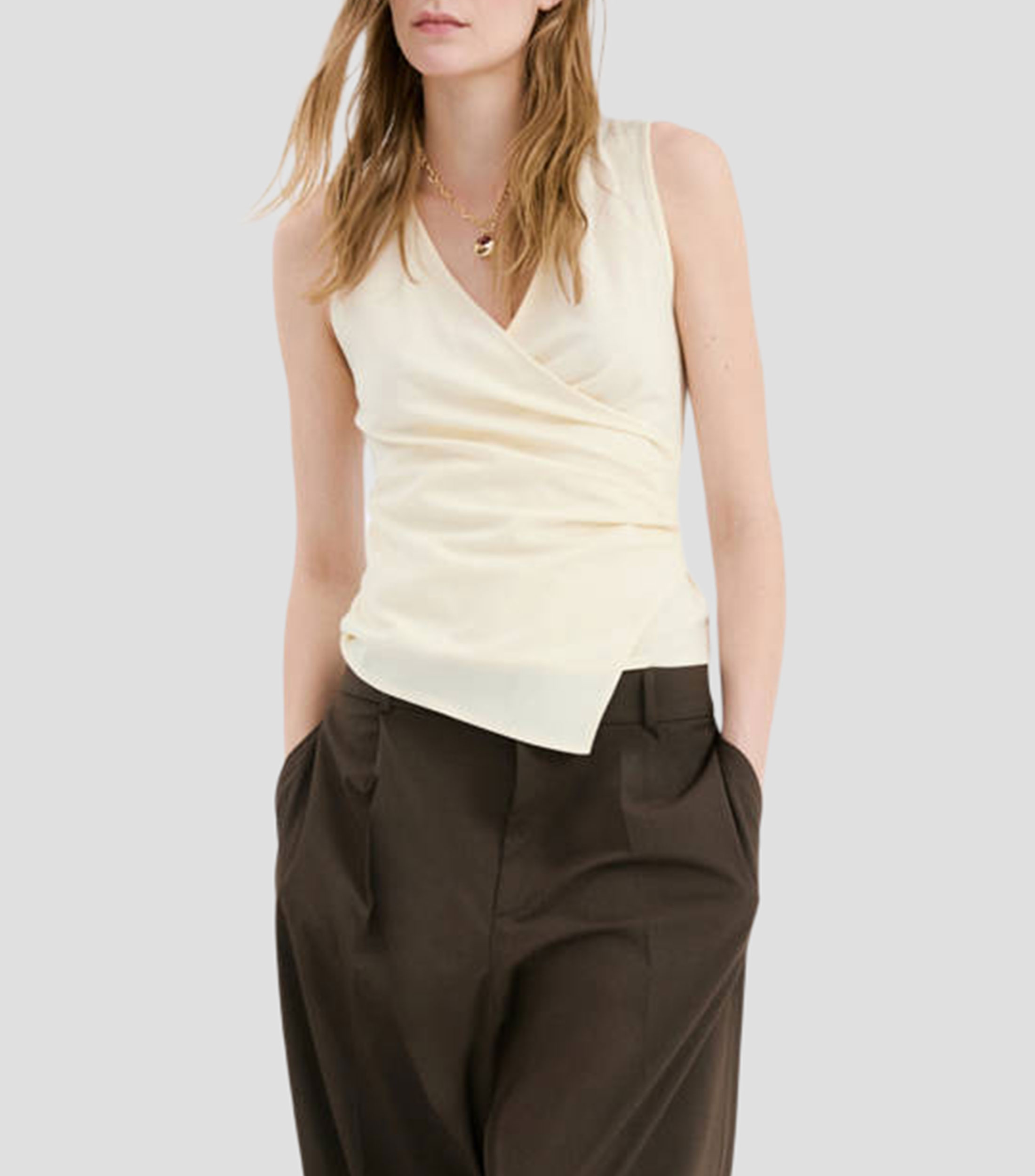 Blusa lisa sin mangas Mujer