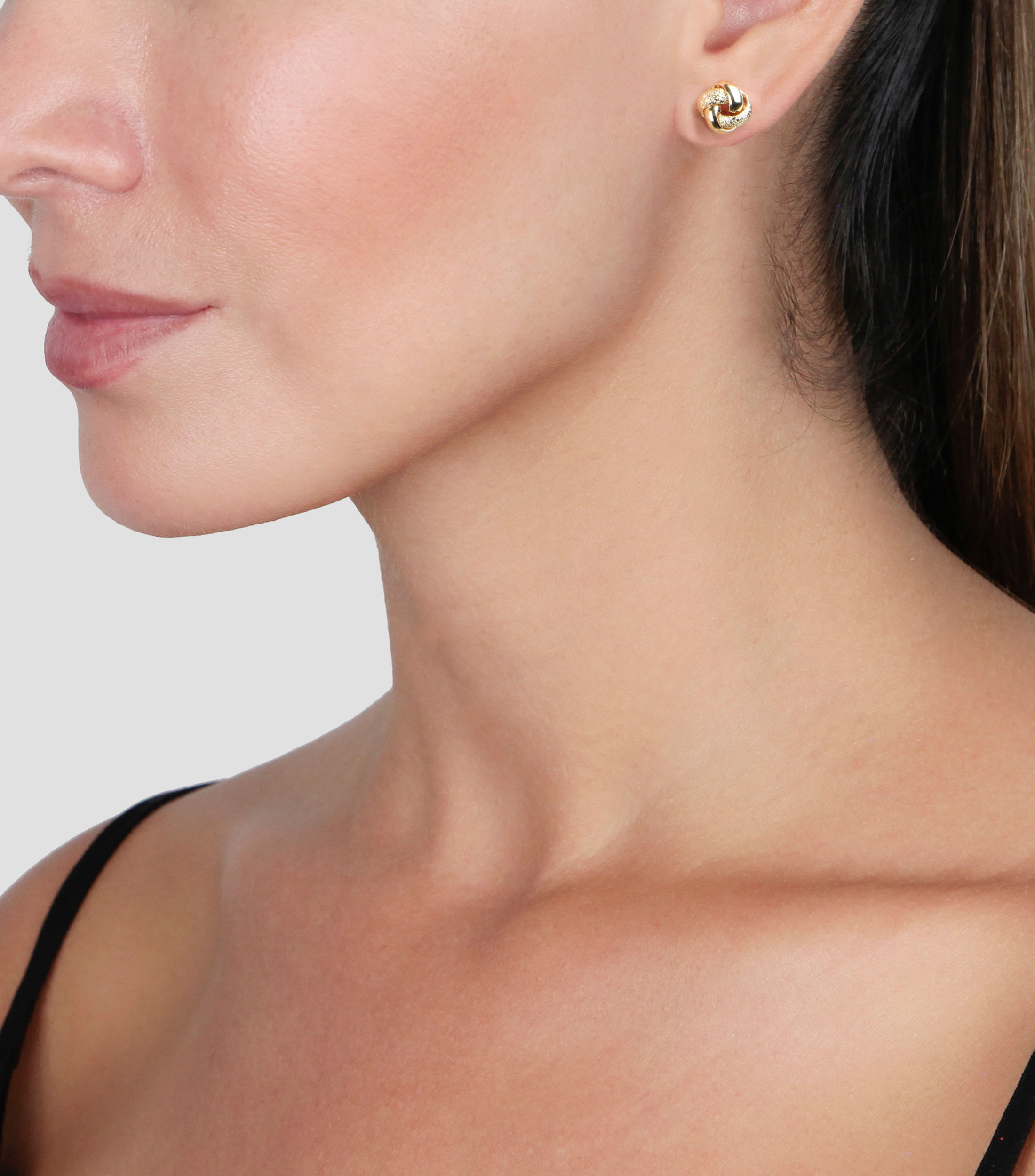 Aretes en Oro de 14 kilates entrelazados Mujer