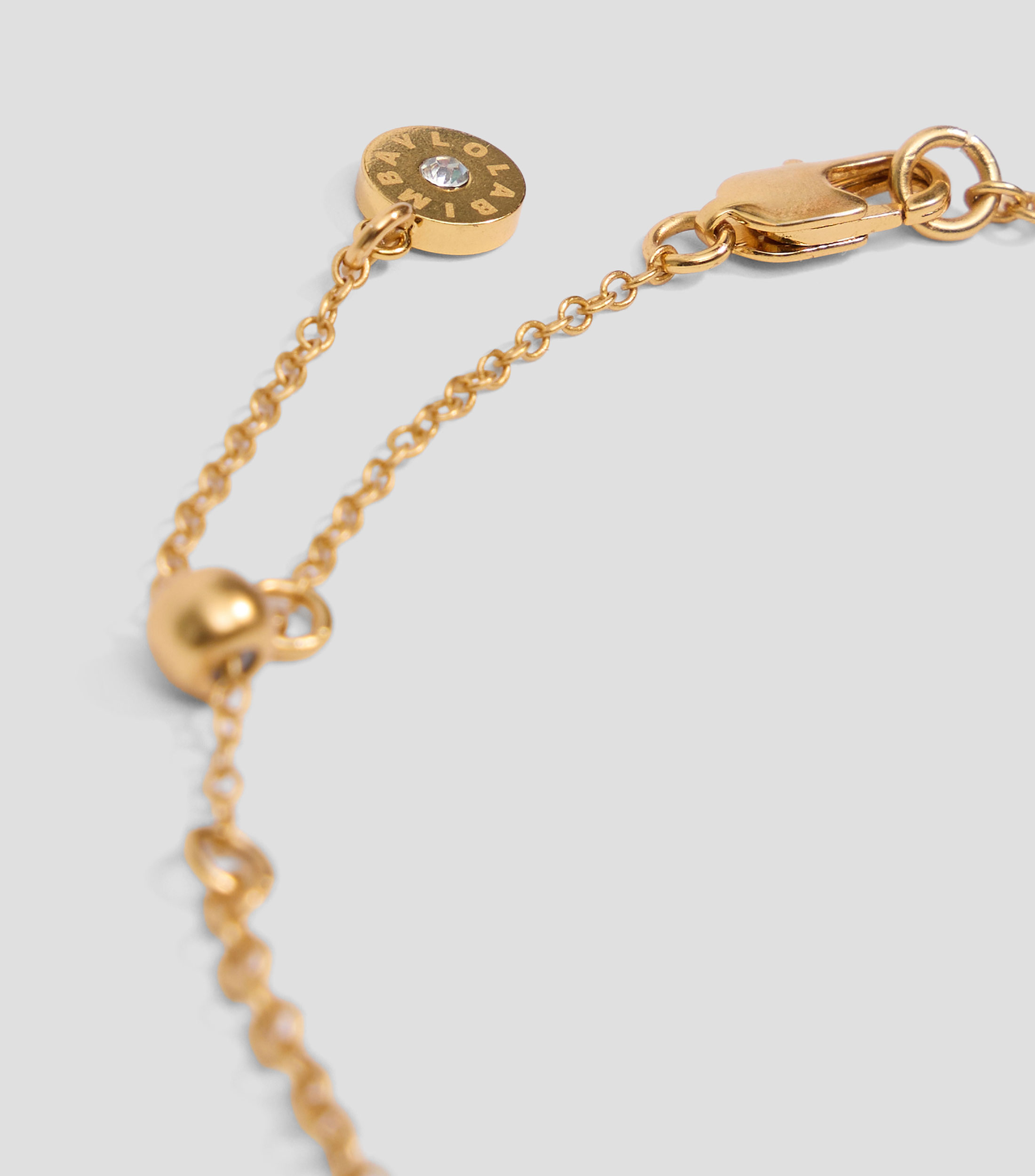 Collar pez y caracolas dorado envejecido Mujer
