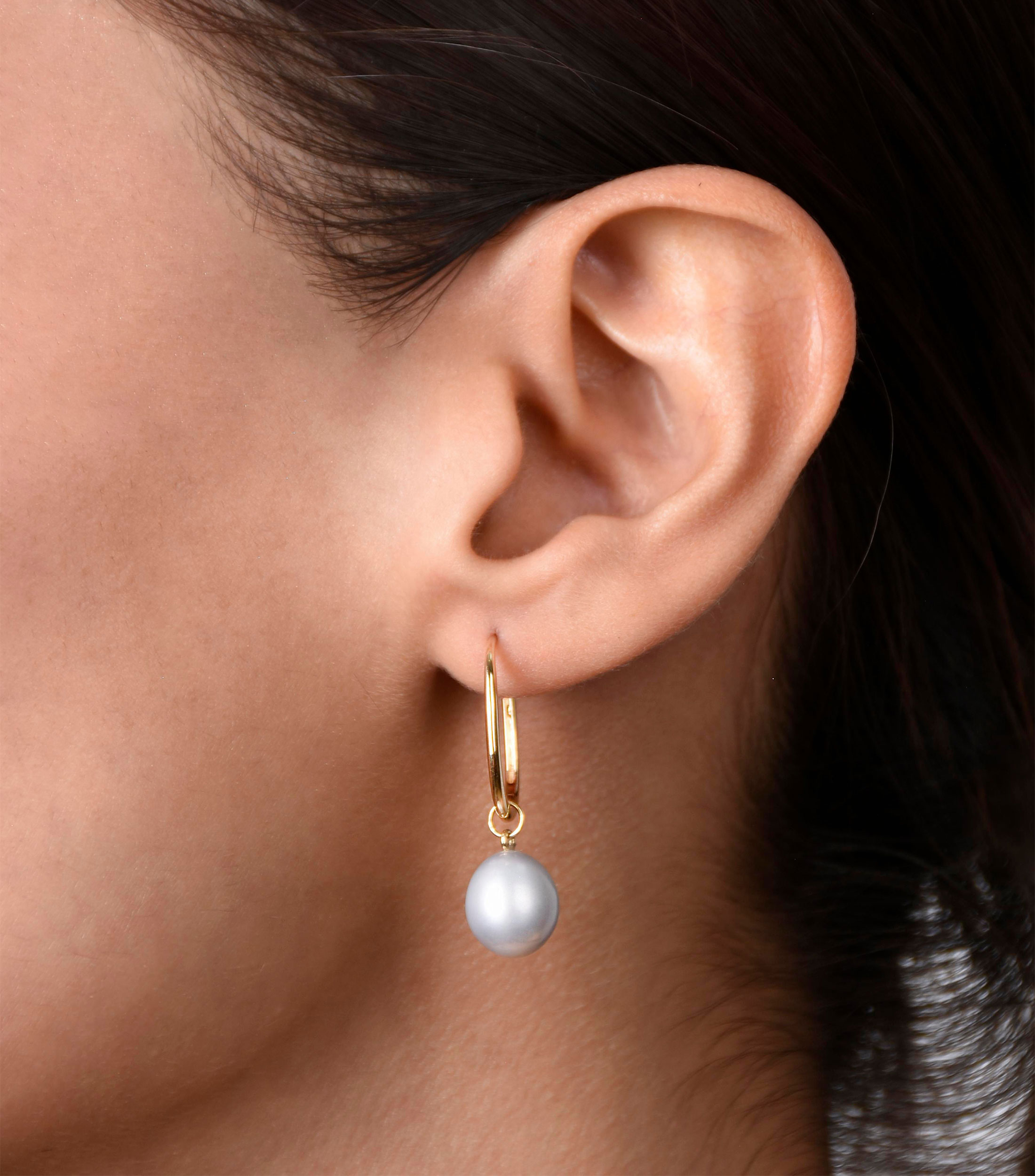 Aretes en oro amarillo 18 kilates con perla Mujer