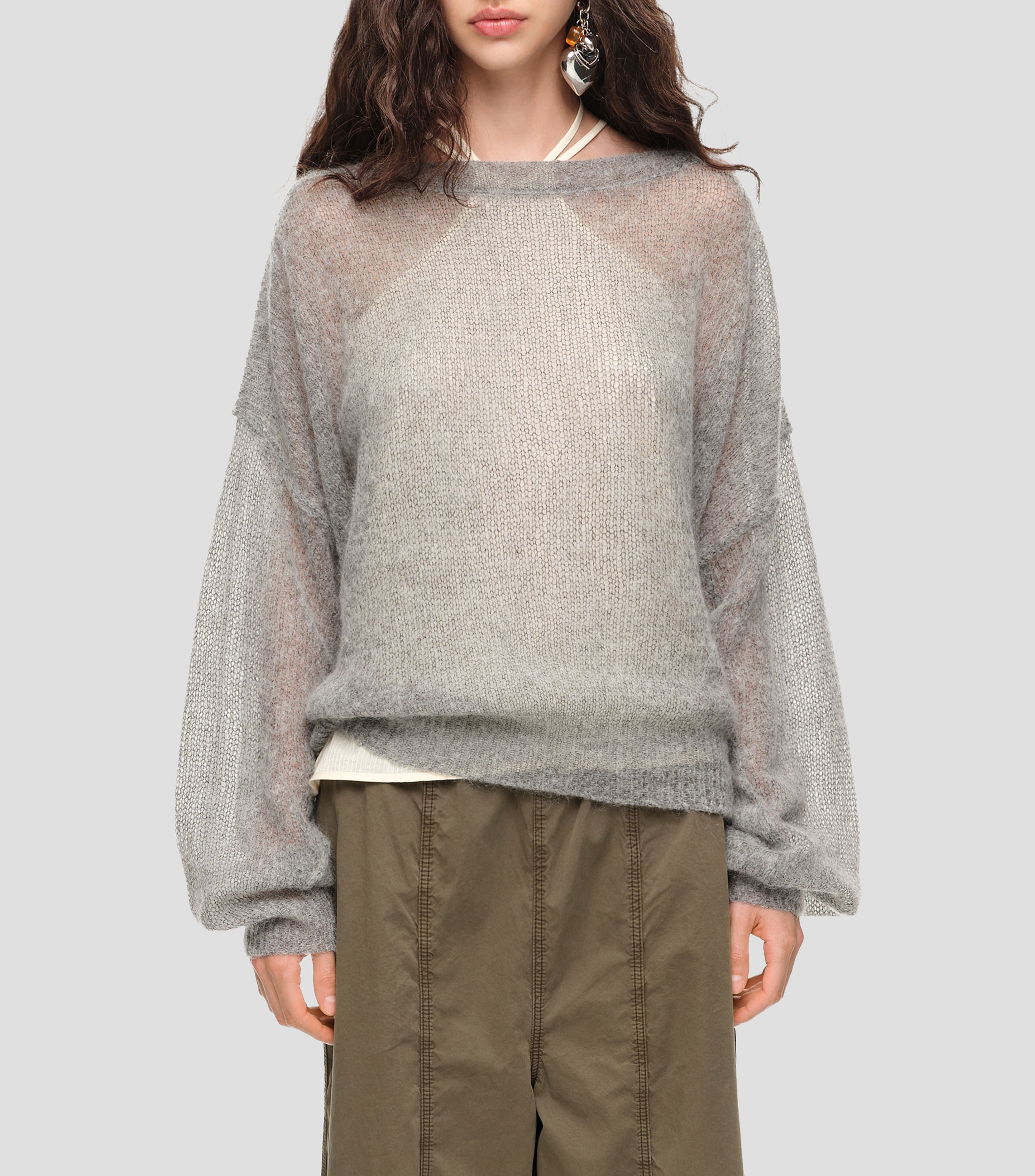 Suéter mohair escote barco melange Mujer