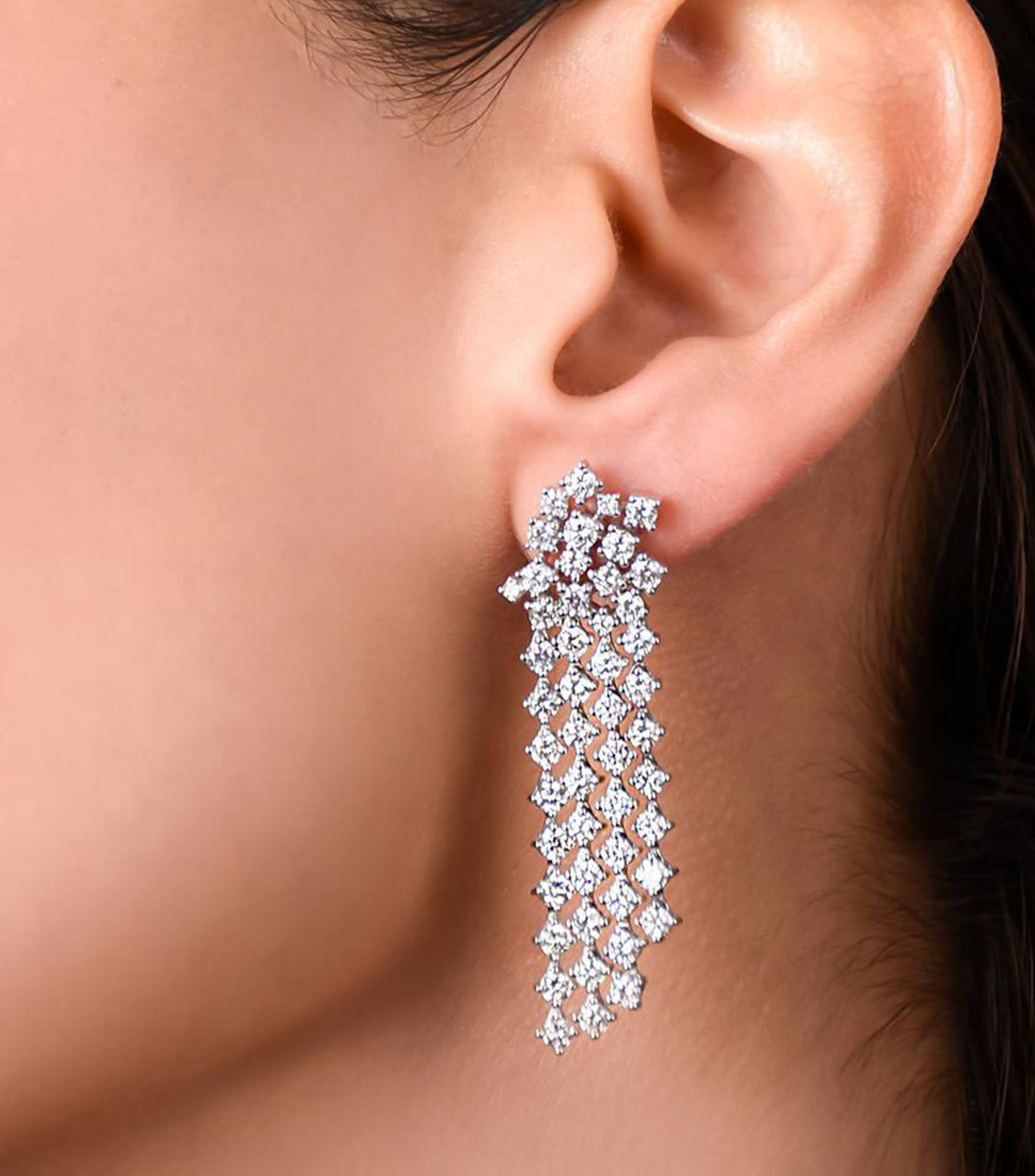 Aretes en oro blanco de 14 kilates con diamante Mujer