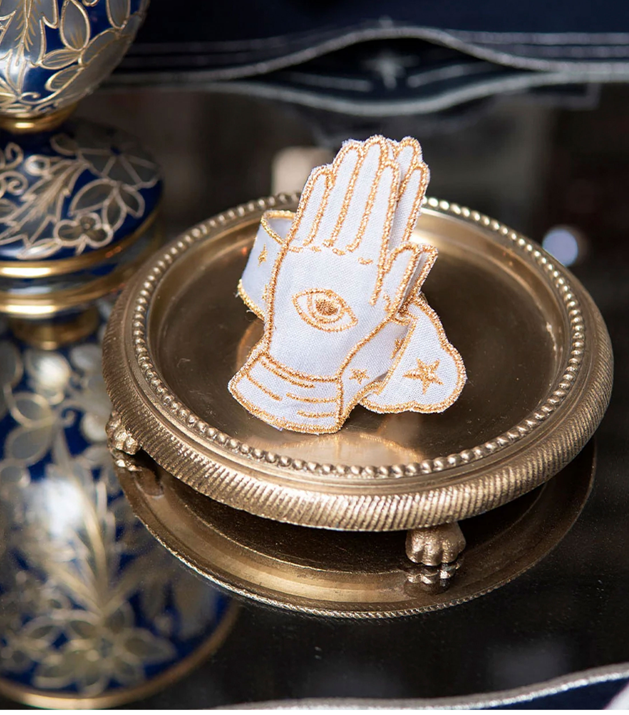 Set de 4 servilleteros Talismán doradas