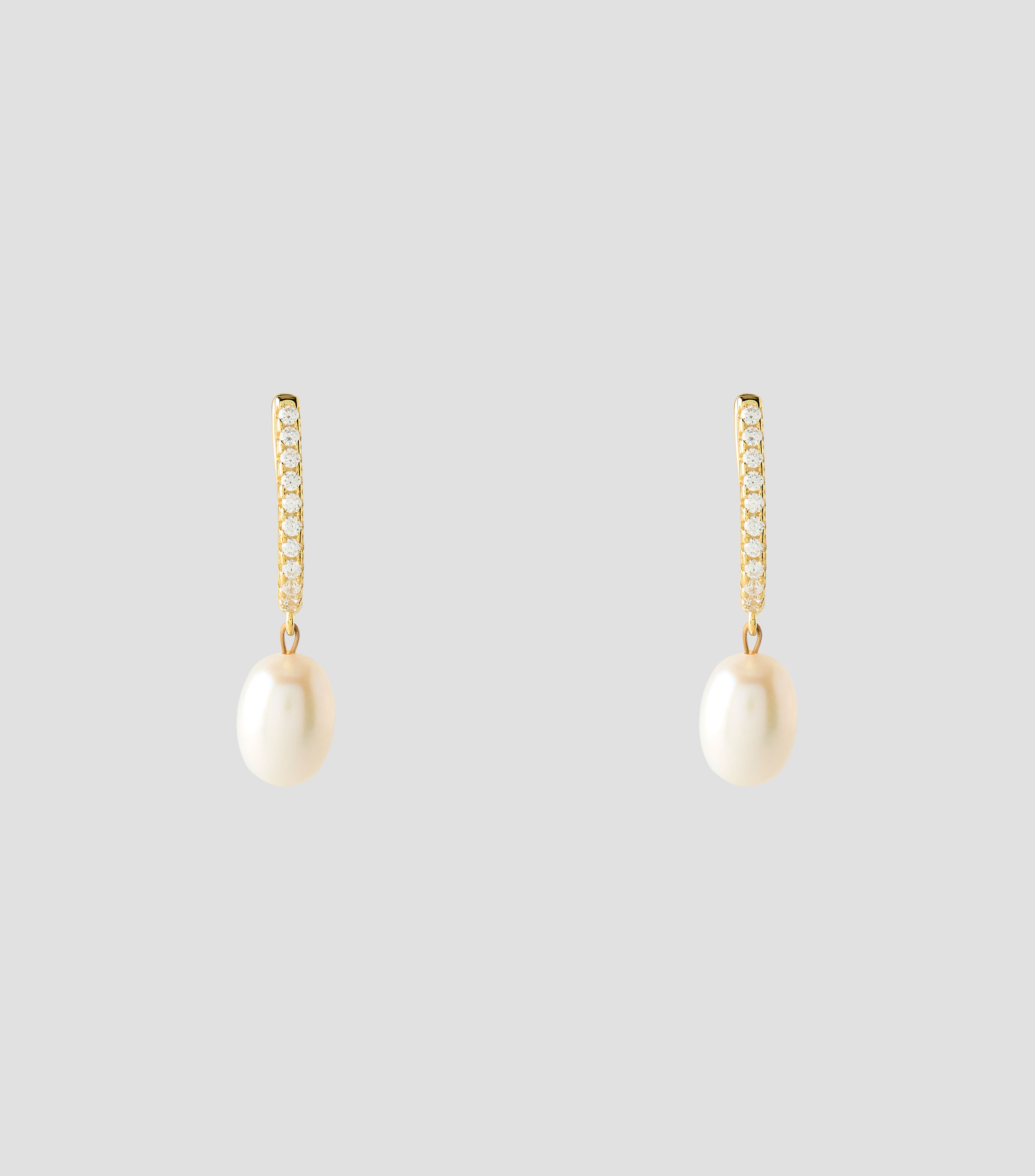 Aretes ovalados con perla Mujer
