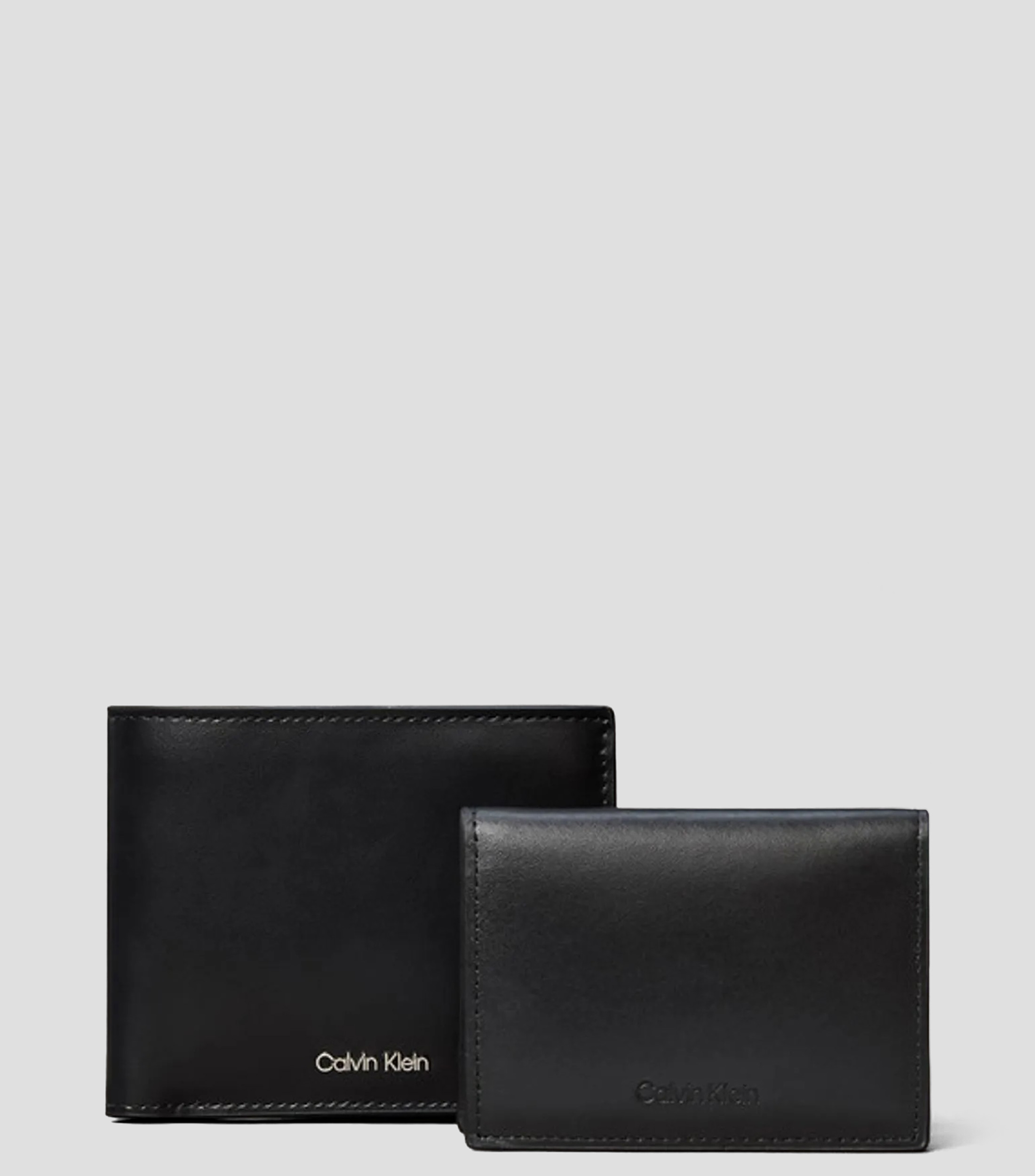 Cartera bifold en cuero de vaca lisa Hombre