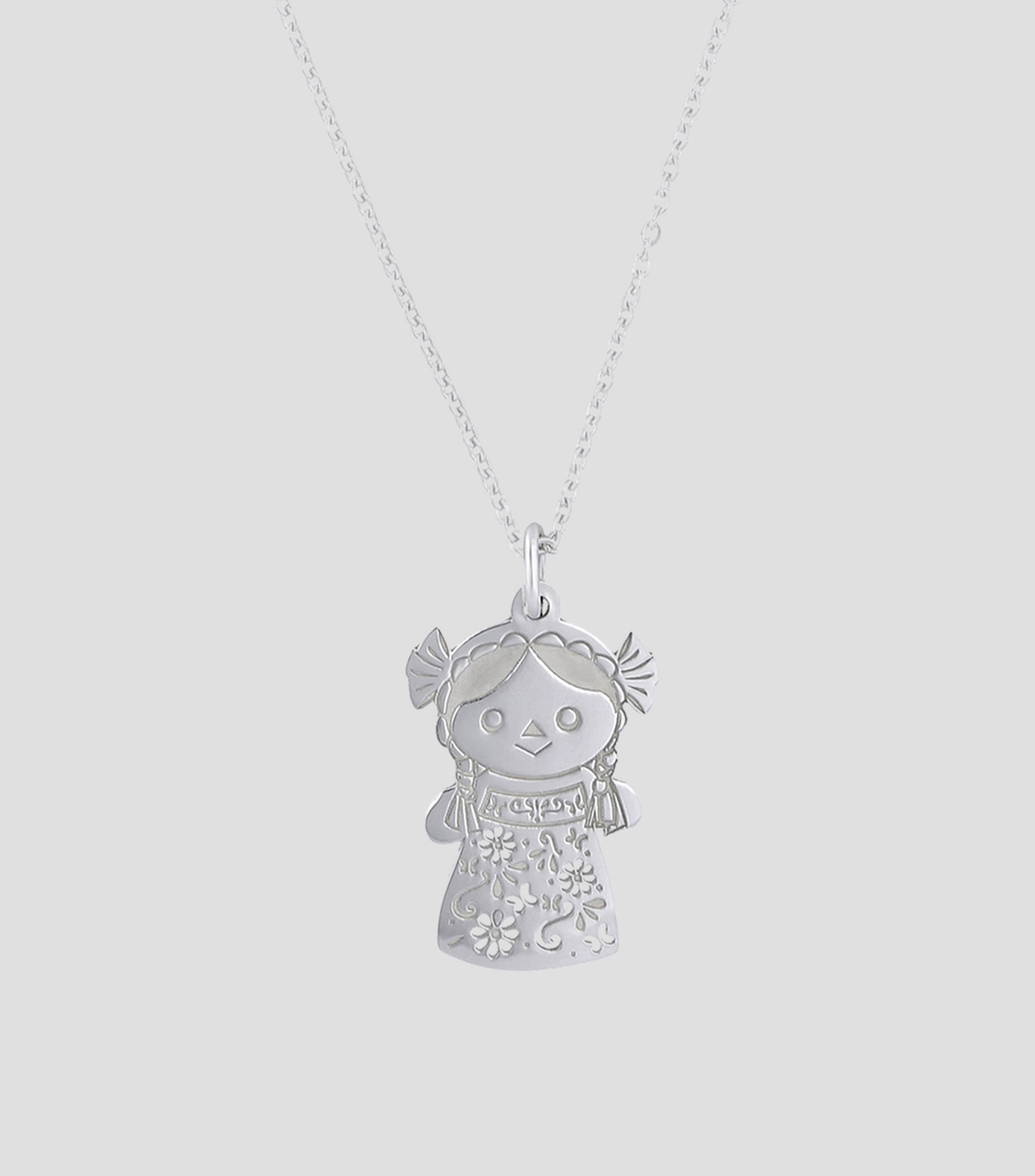 Dije en plata Mujer