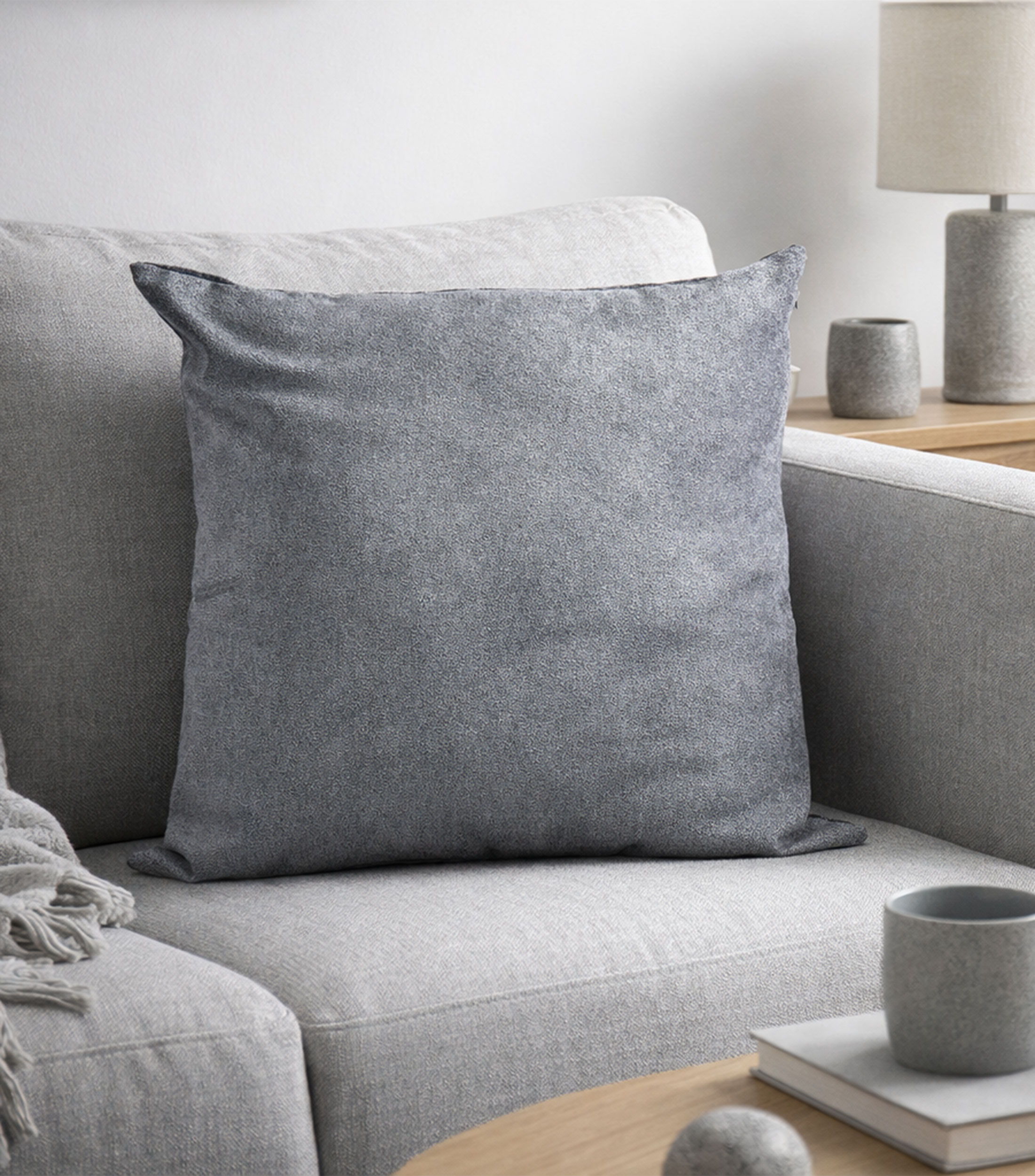 Cojín decorativo gris