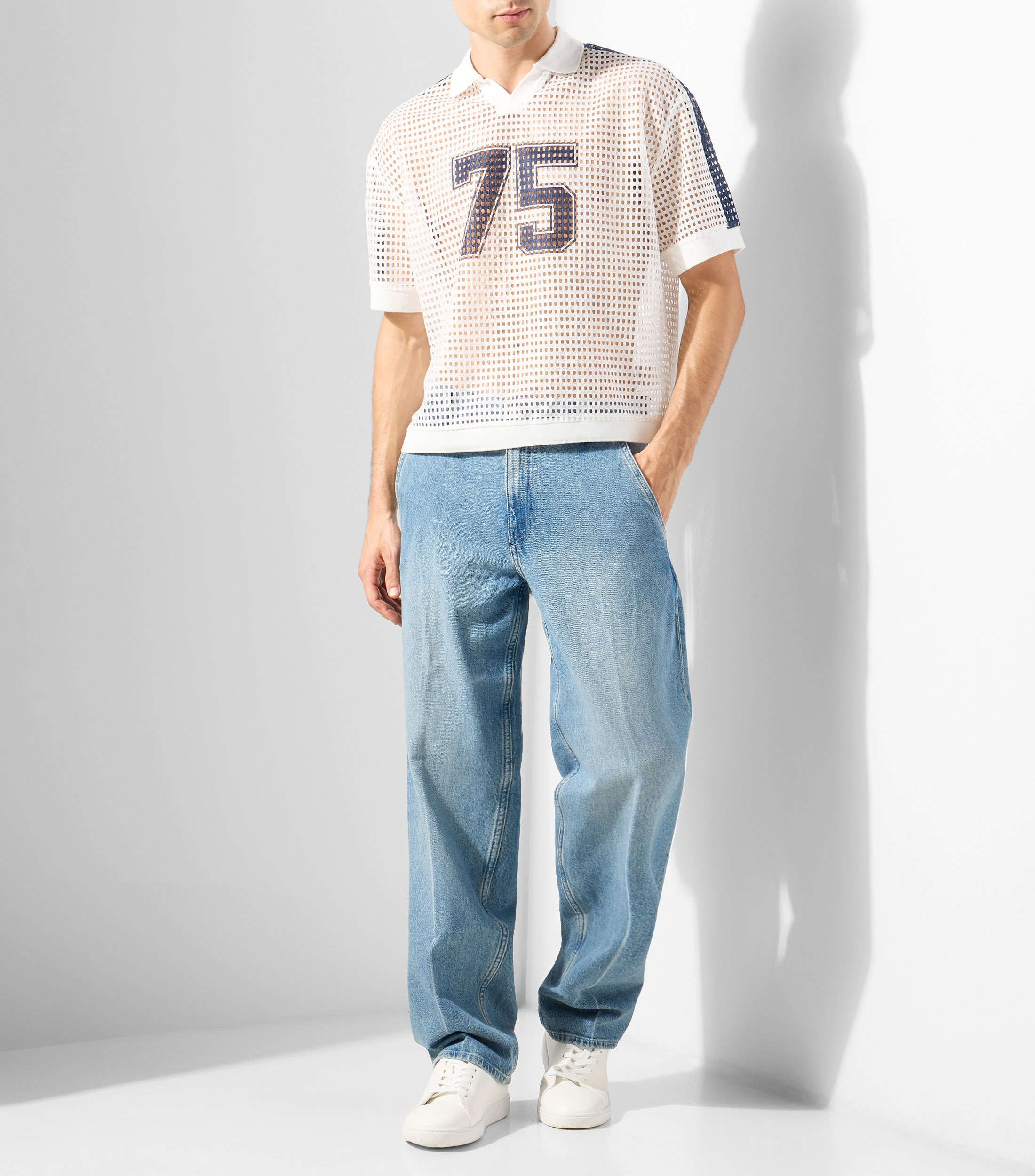 Playera tipo polo manga corta estampada Hombre