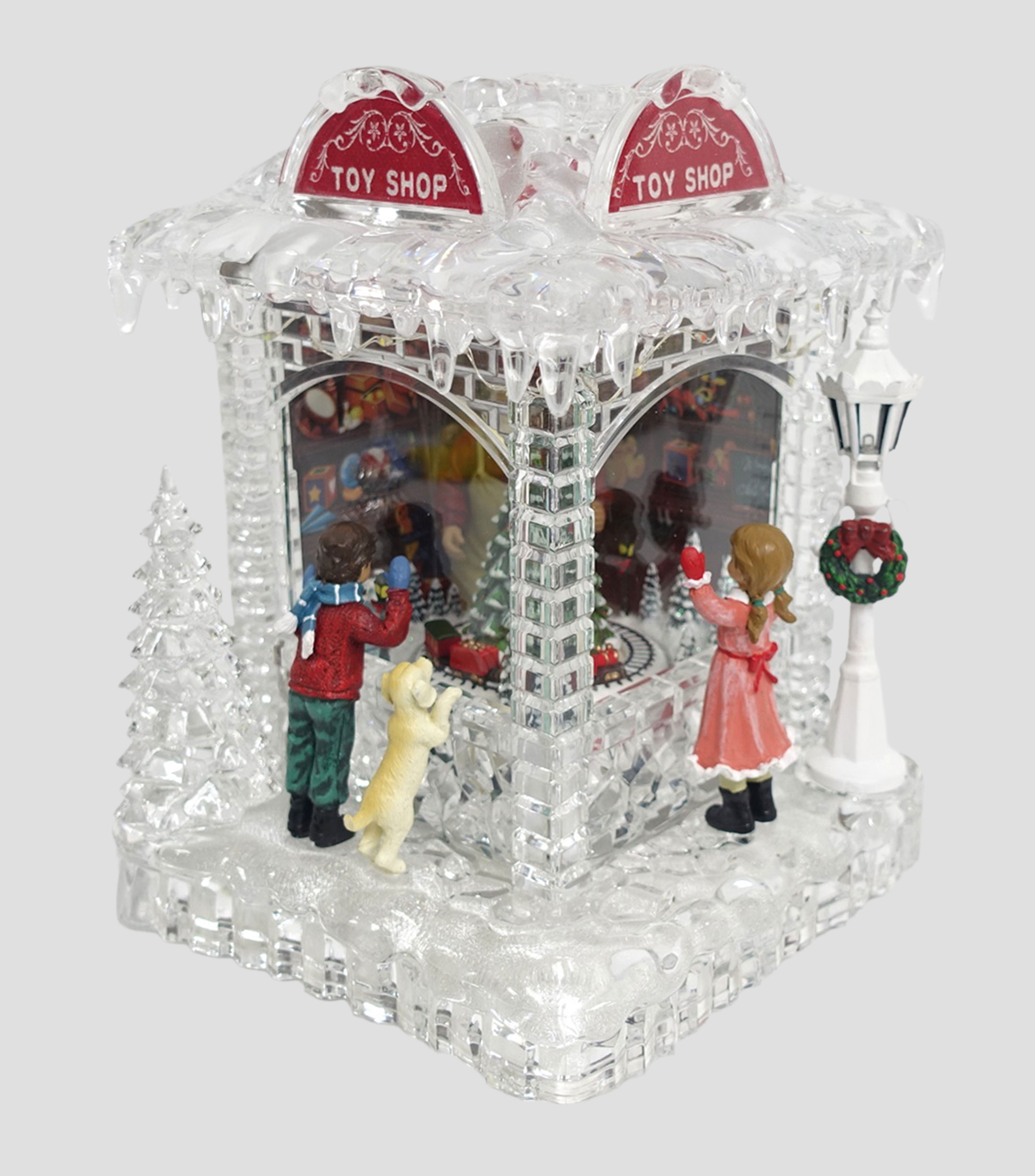 Figura decorativa Navideña Tienda de Juguetes con luz y música