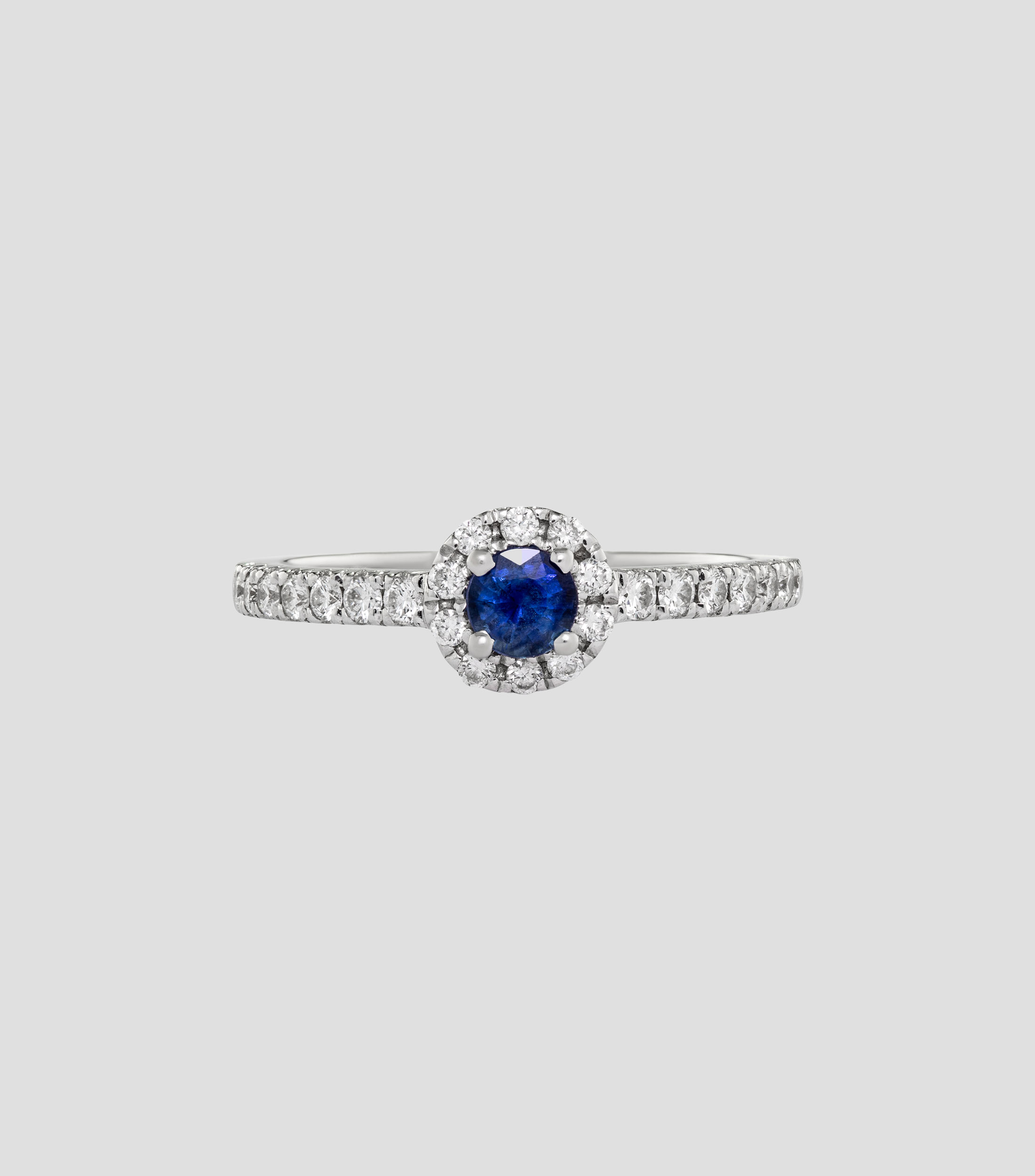 Anillo en Oro blanco de 18 Kilates con zafiro y diamantes Mujer