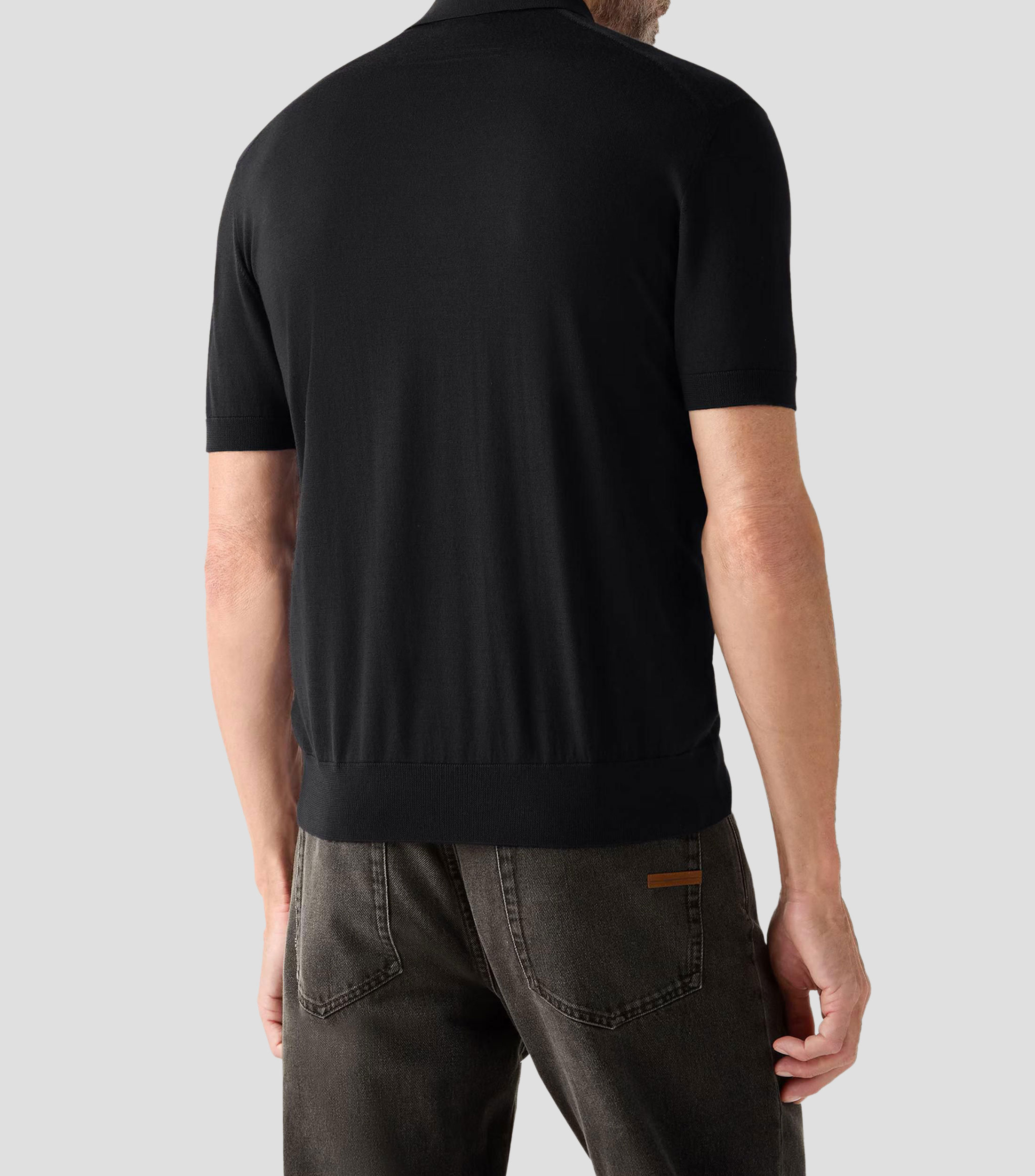 Playera tipo polo con manga corta lisa Hombre