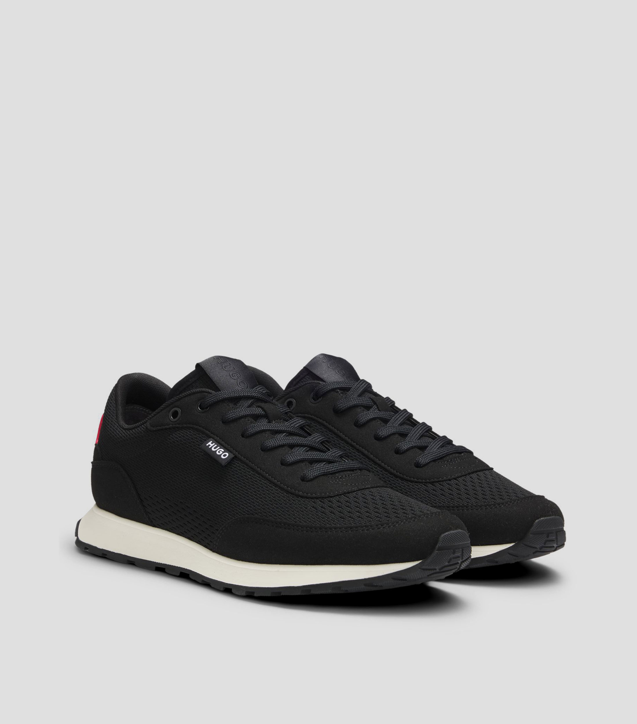 Tenis con empeine de punto y etiqueta con logo Hombre