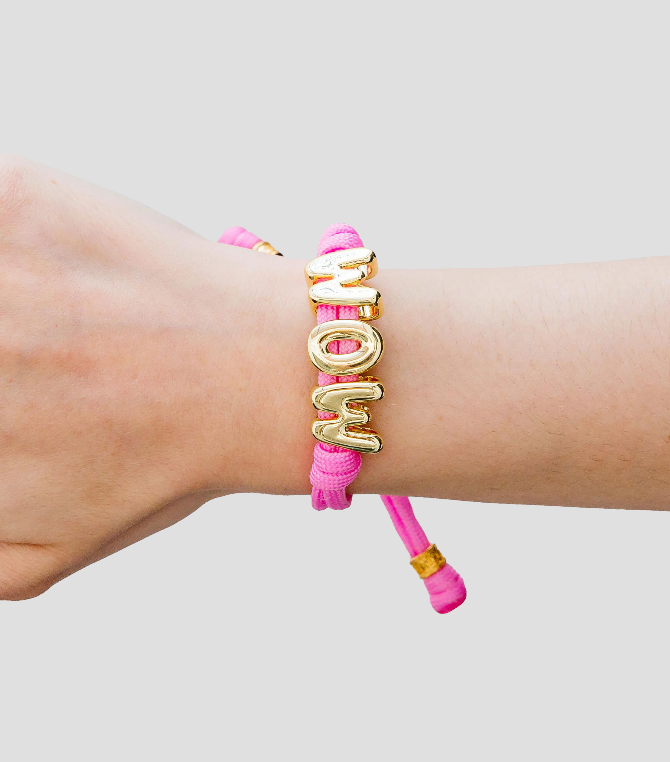 Pulsera con dijes de letras Mujer