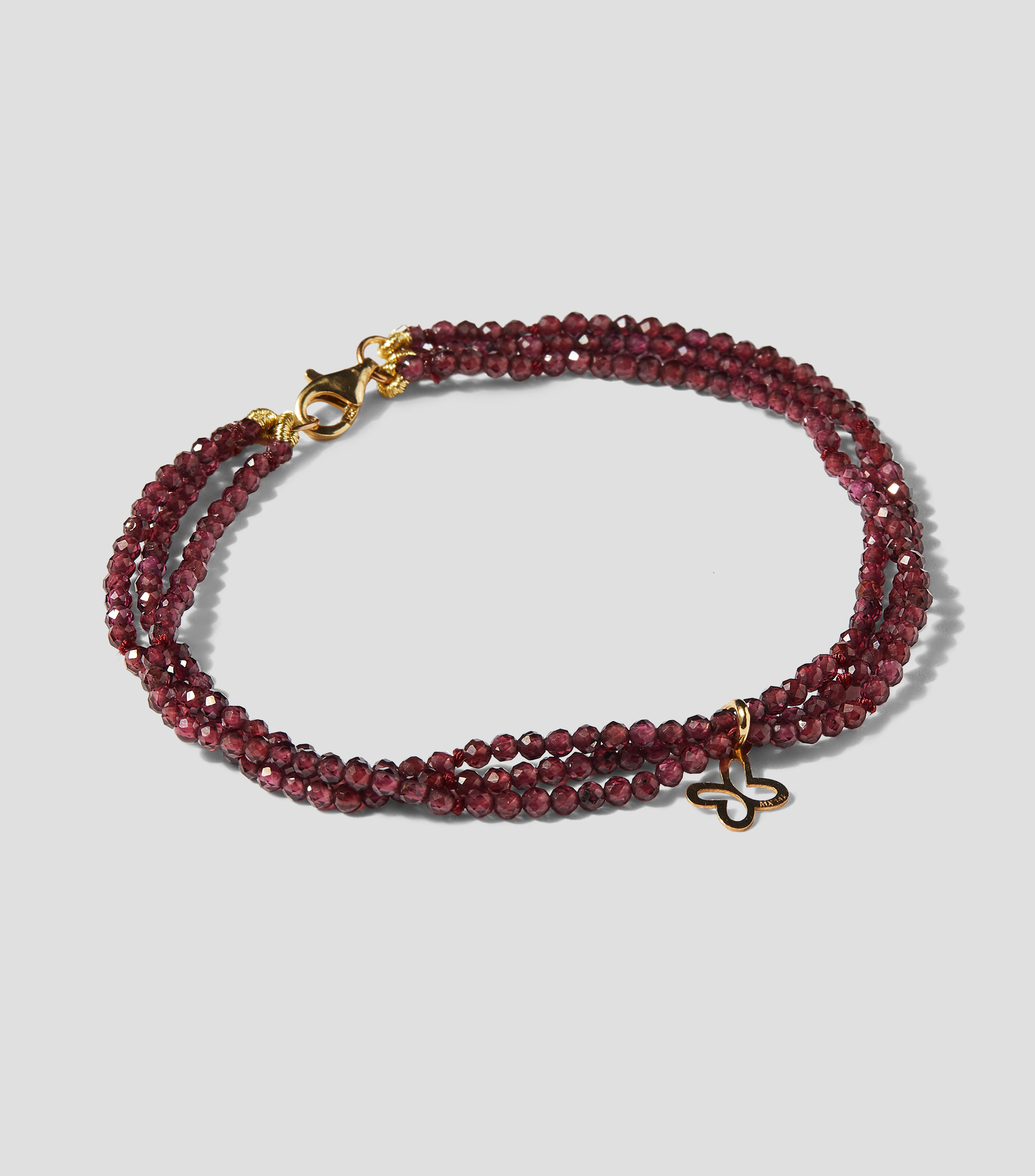 Pulsera triple con charm de mariposa Mujer