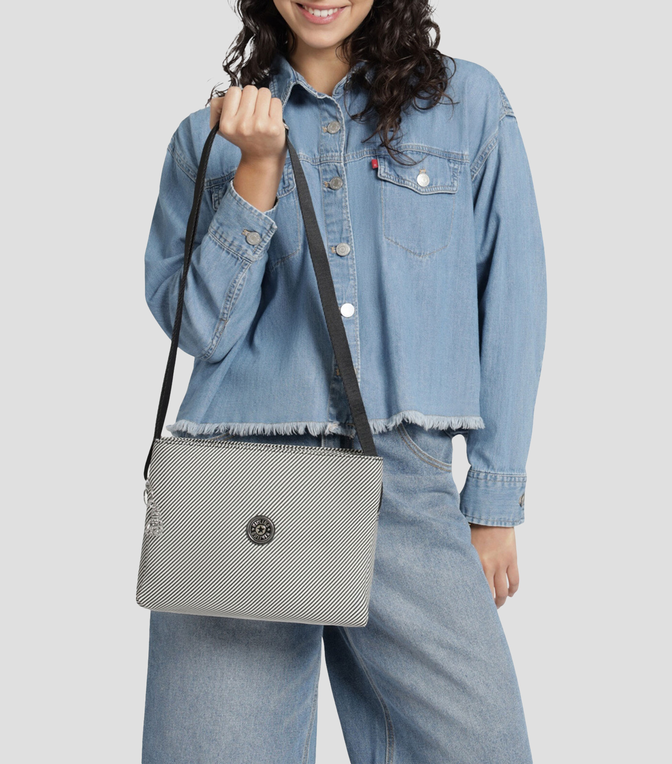 Bolsa crossbody a rayas Niña
