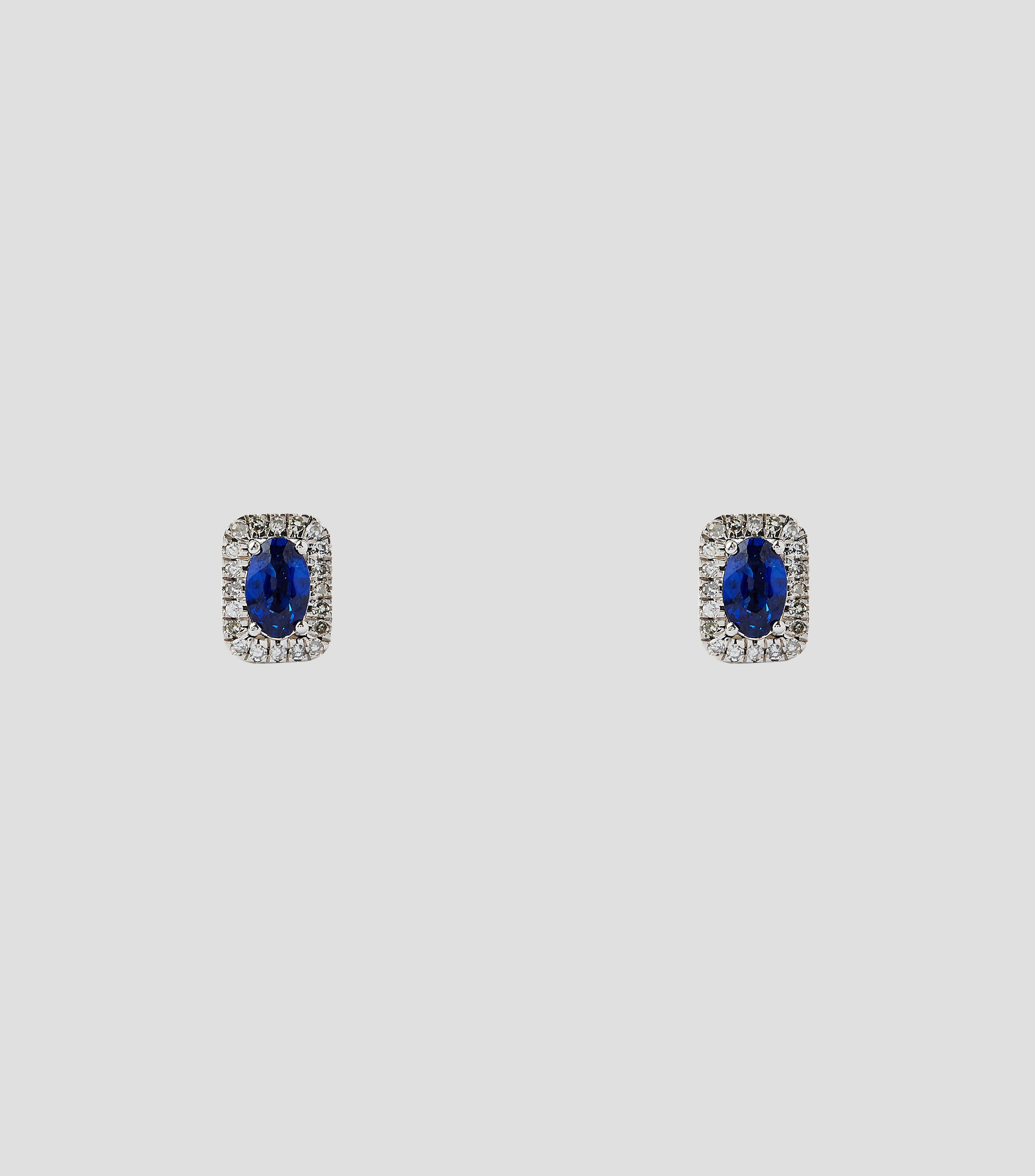 Aretes en Oro blanco de 14 Kilates con brillante y zafiro Mujer